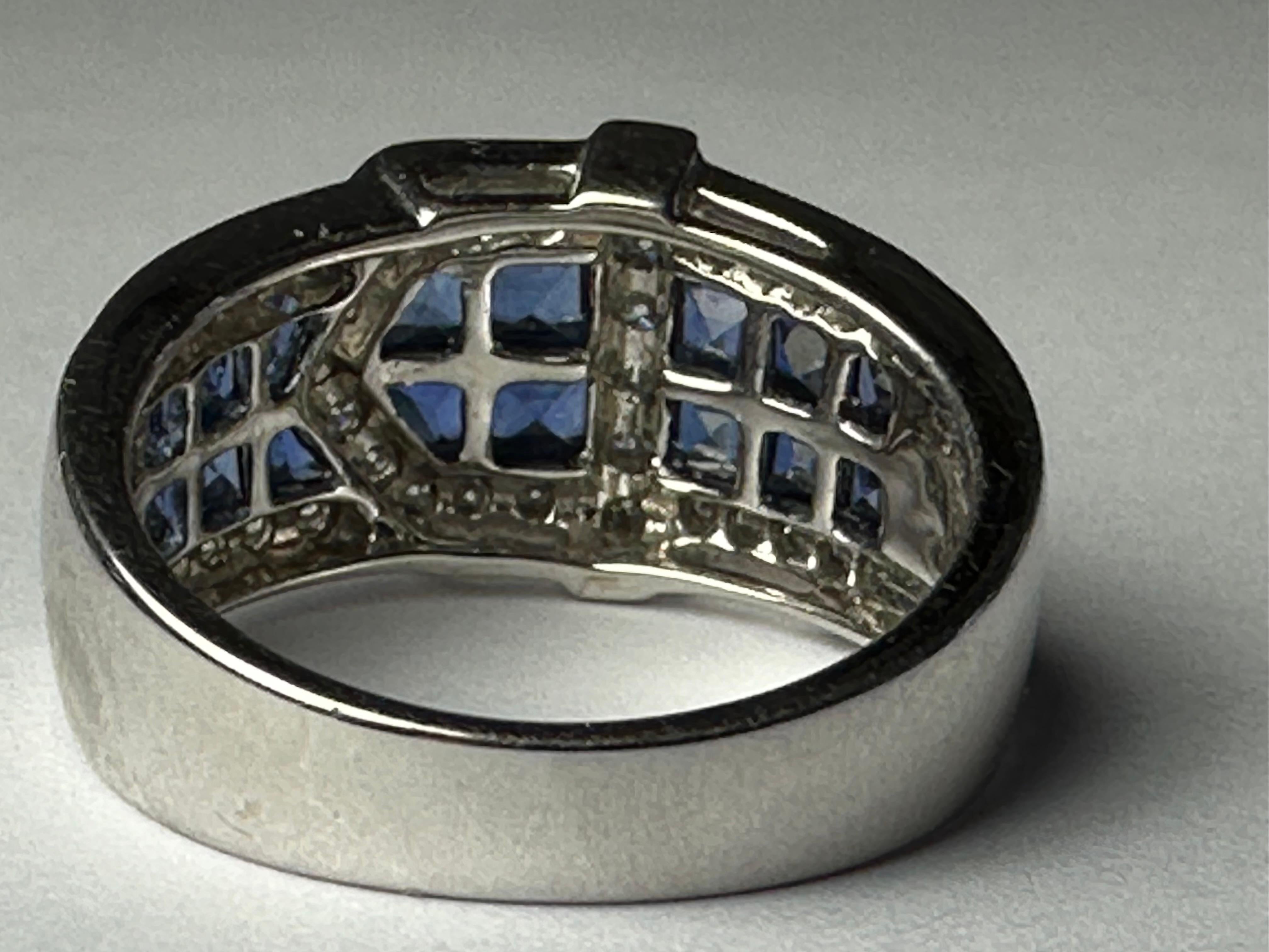 Modern Estate Diamond and Blue Sapphire Buckle Ring  For Sale