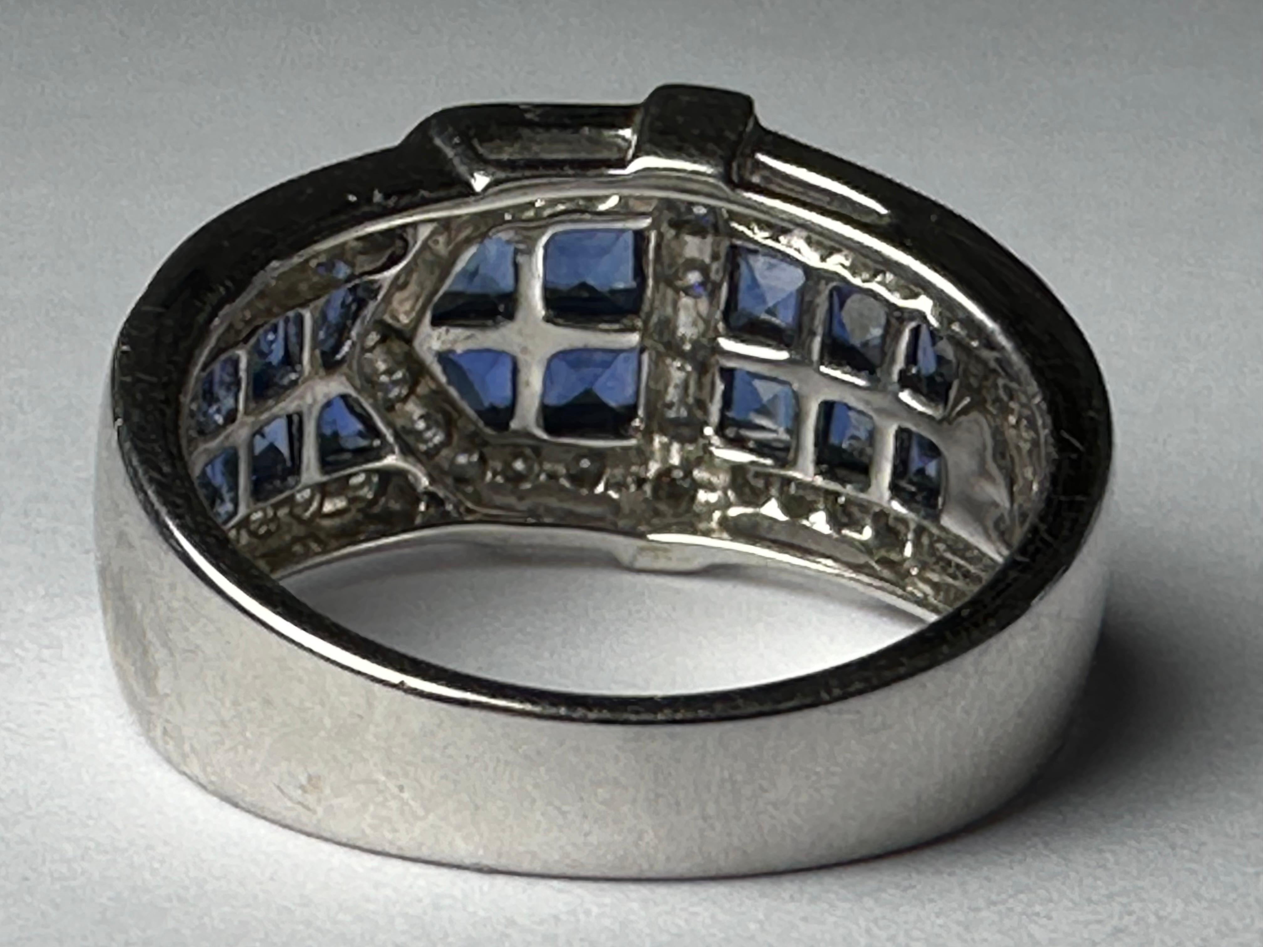 Brilliant Cut Estate Diamond and Blue Sapphire Buckle Ring  For Sale