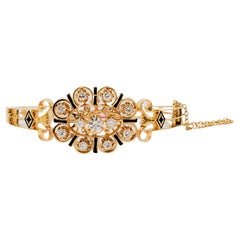 Bracciale con diamanti e smalto in oro giallo 14k