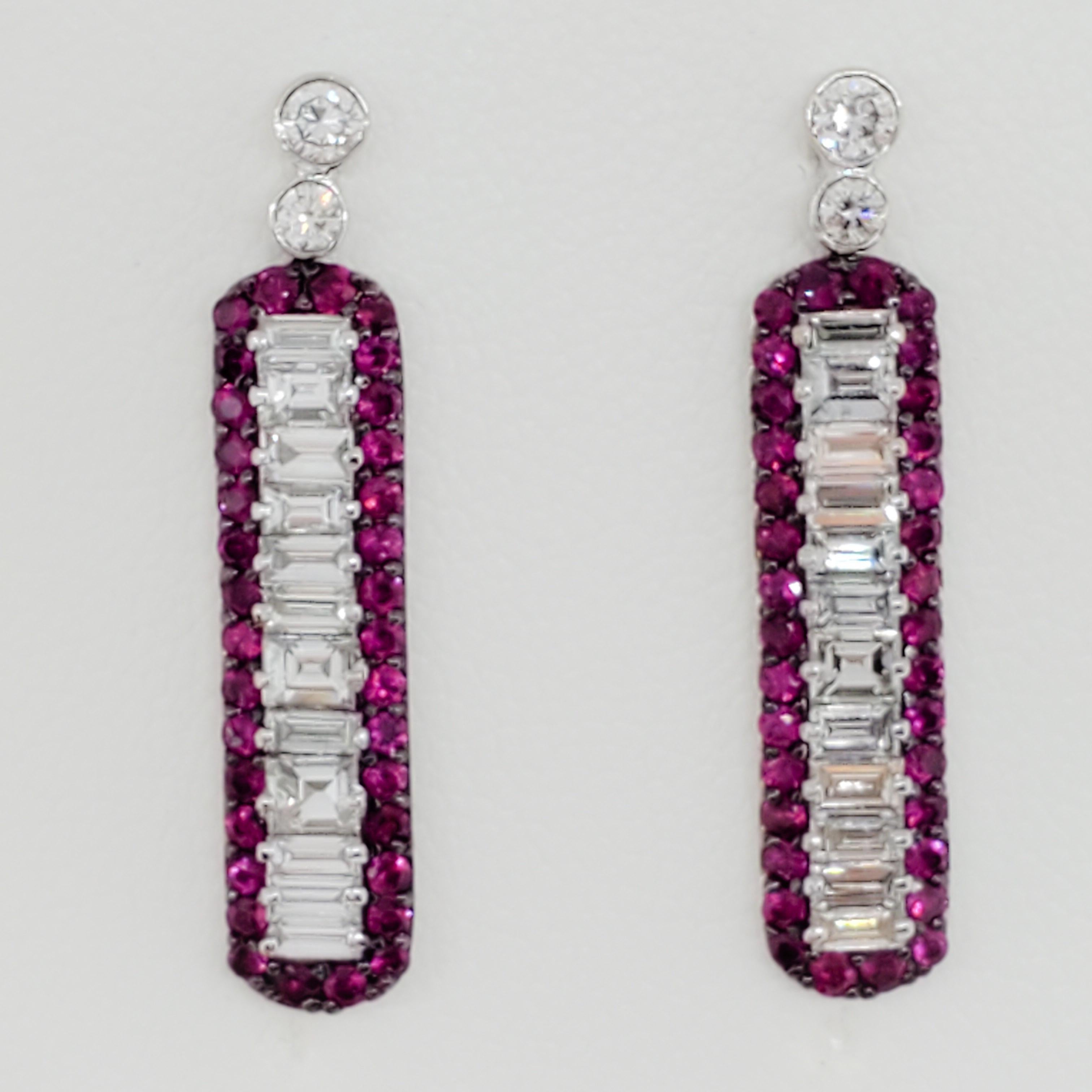 Gorgeous earrings featuring 1.24 ct. of good quality, white, and bright baguette diamonds with 0.90 ct. of deep red ruby rounds.  Handmade 18k white gold mounting.