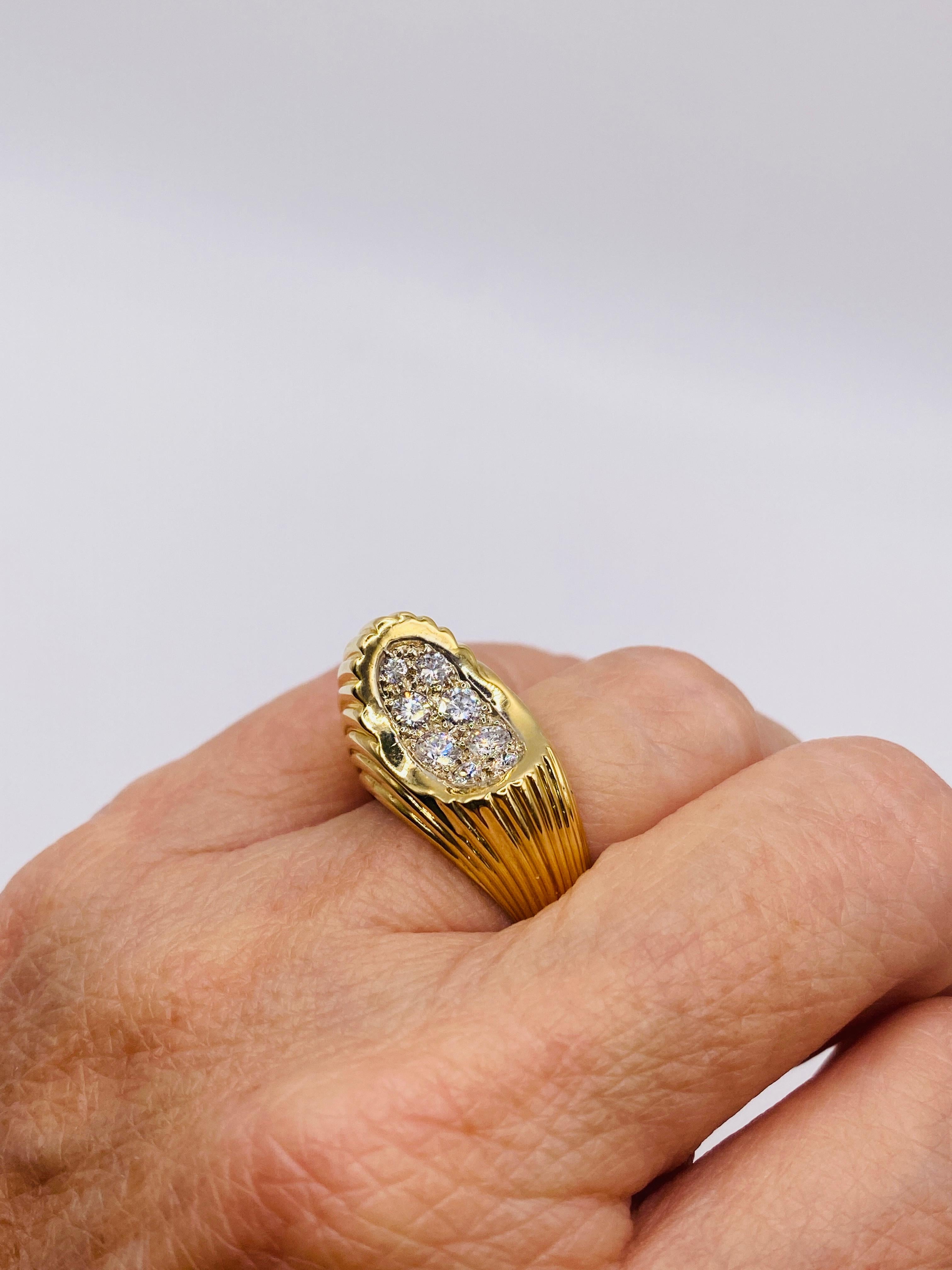 Estate 0.70 carat total weight G.VS round brilliant cut diamonds 14k yellow gold horseshoe ring. 7.7 dwt. Size 6