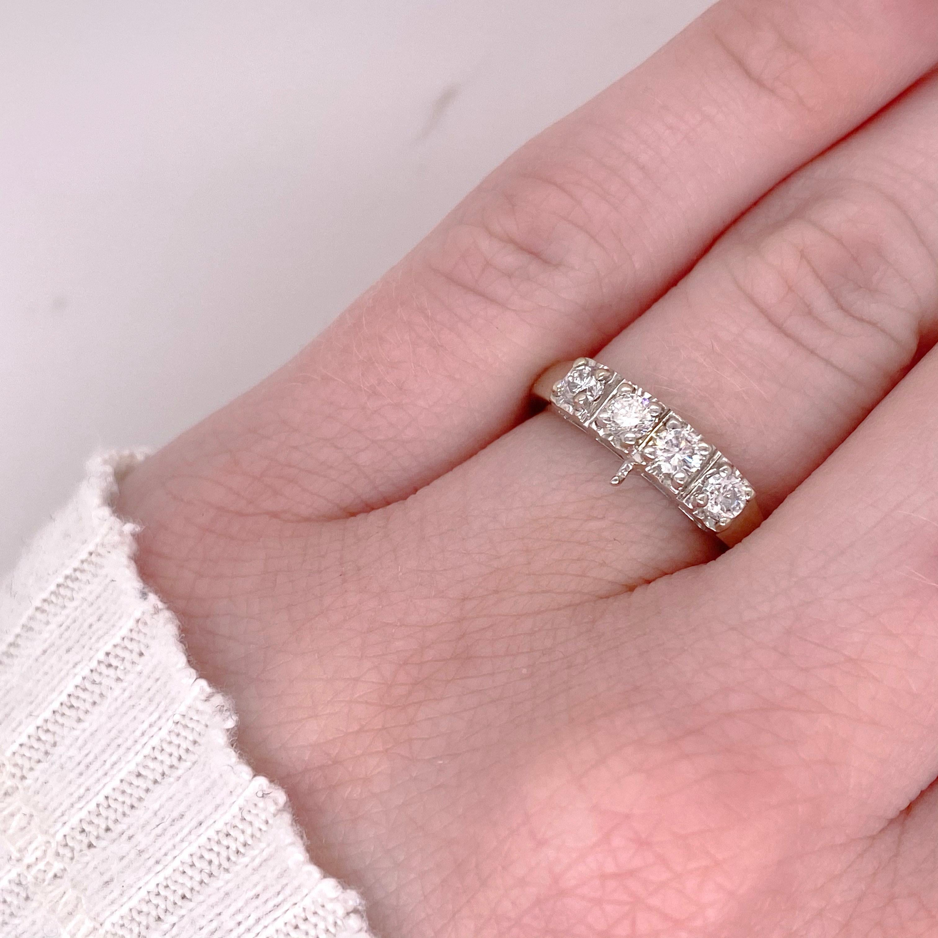 This diamond band is a beauty!  It has four full cut diamonds of high quality that are set in square illusion settings that match up perfectly with one of our estate diamond engagement rings.  The engagement ring item number is ___________. There is