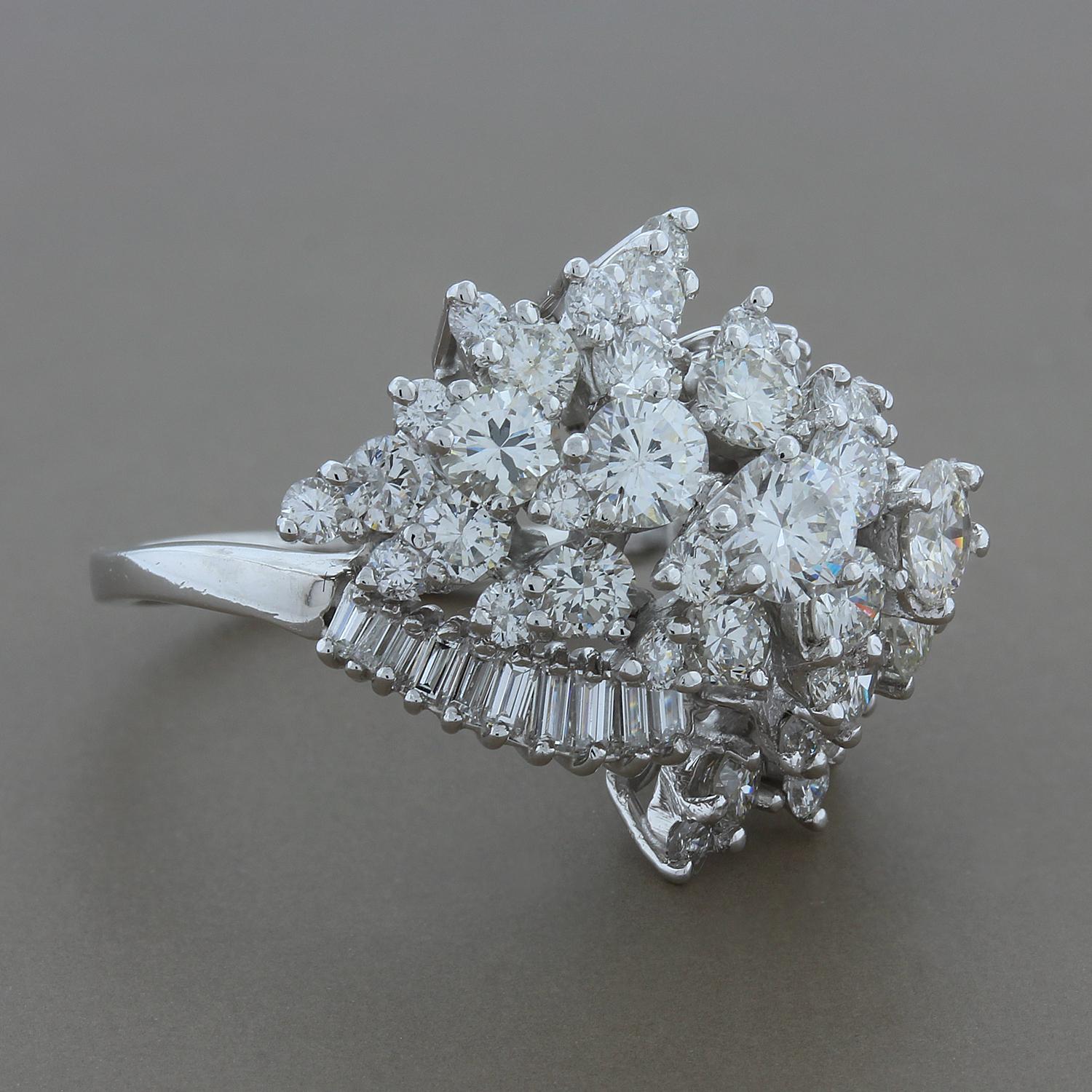 Indulge yourself in this perfectly domed cluster ring featuring 3.26 carats of sparkling white VS quality diamonds. The round cut and baguette cut diamonds are all set in platinum for a spectacular finish in this masterfully crafted ring.

Currently