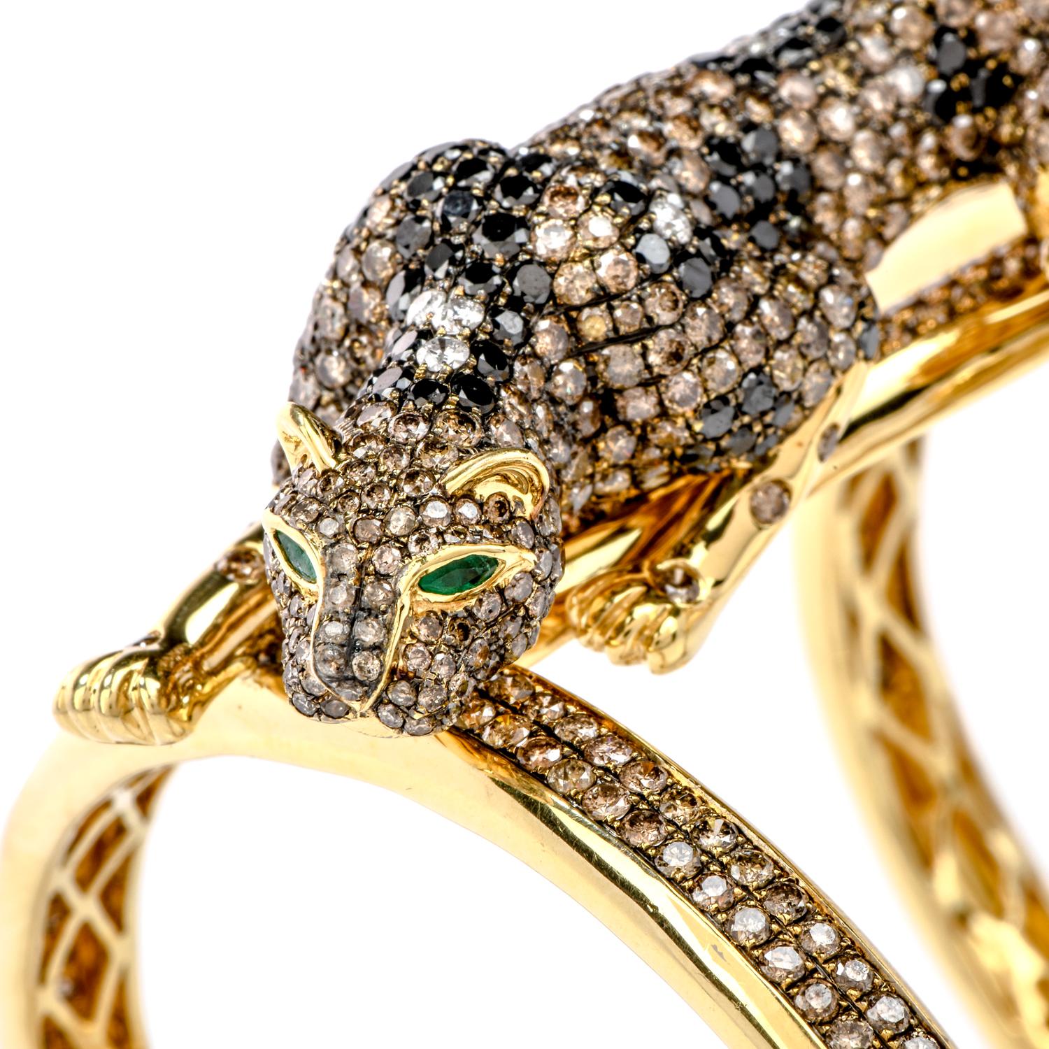 Live life to the fullest extent with this luxurious Estate Diamond Emerald 18K Gold Large Panther Cuff Bangle Bracelet! 

This 18 karat yellow gold crafted bangle bracelet was inspired by a panther motif.  The panther’s mystical eyes are represented