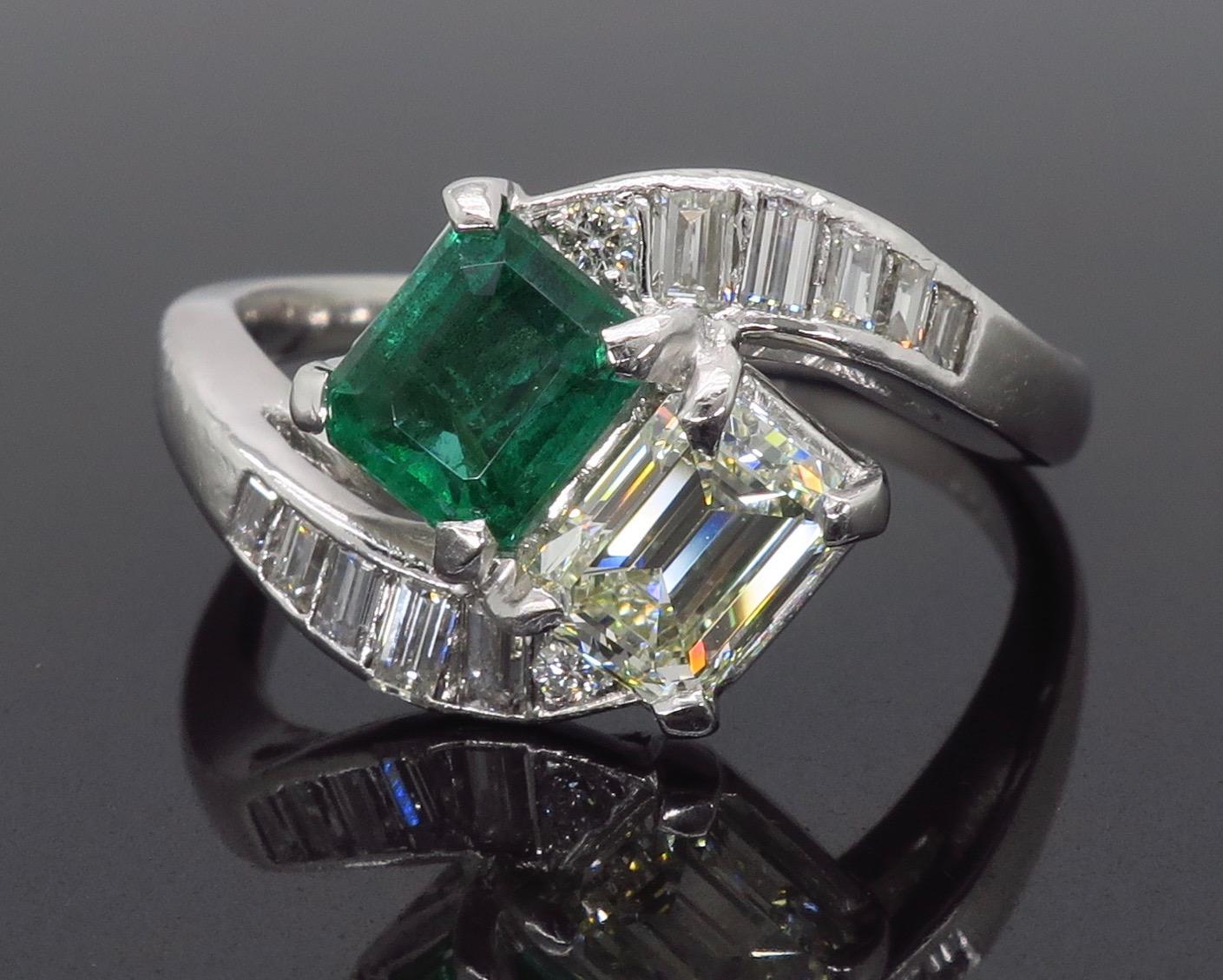 Emerald Cut Estate Diamond and Emerald Bypass Ring in Platinum