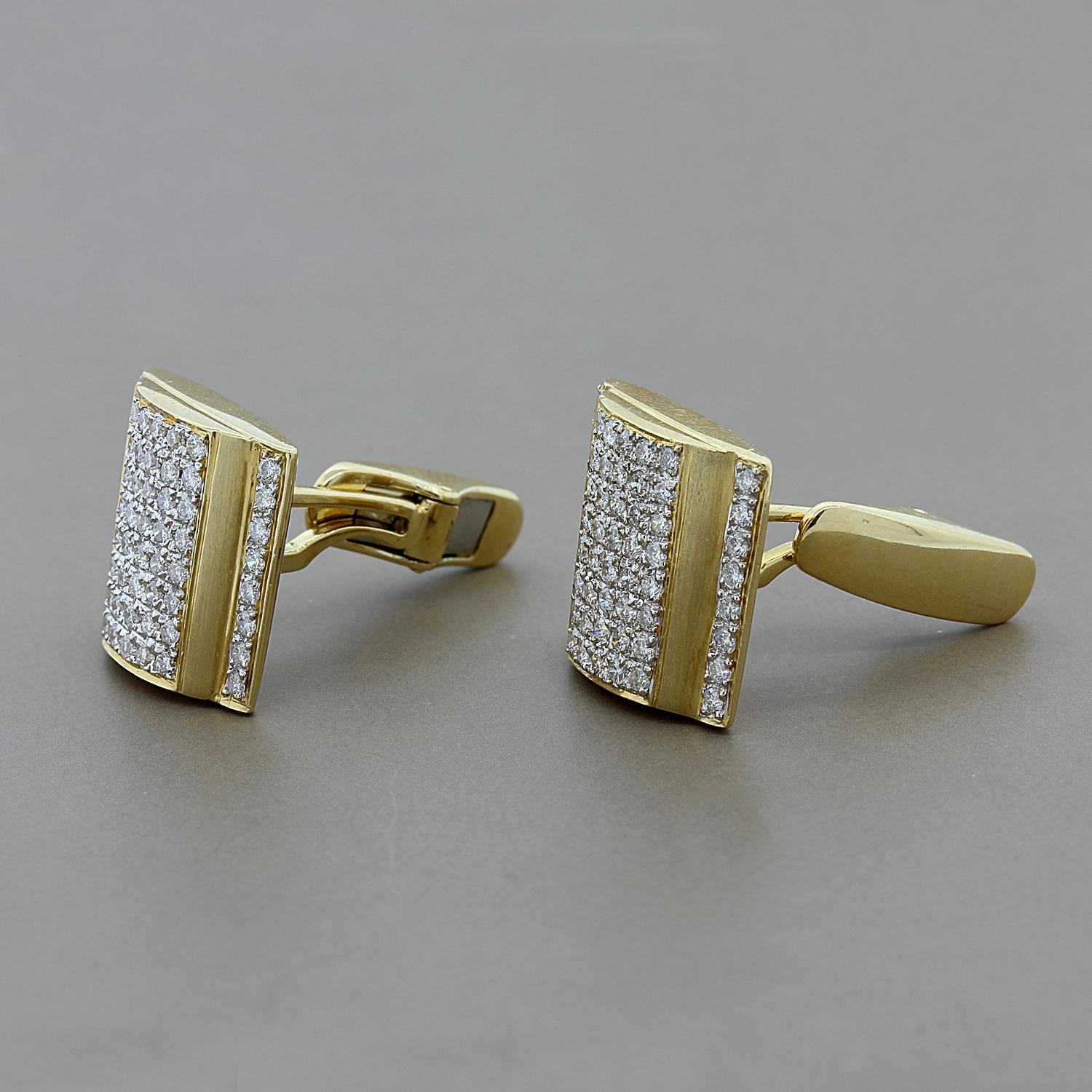 A pair of cufflinks featuring 1.30 carats of diamonds on a panel of 14K yellow gold.