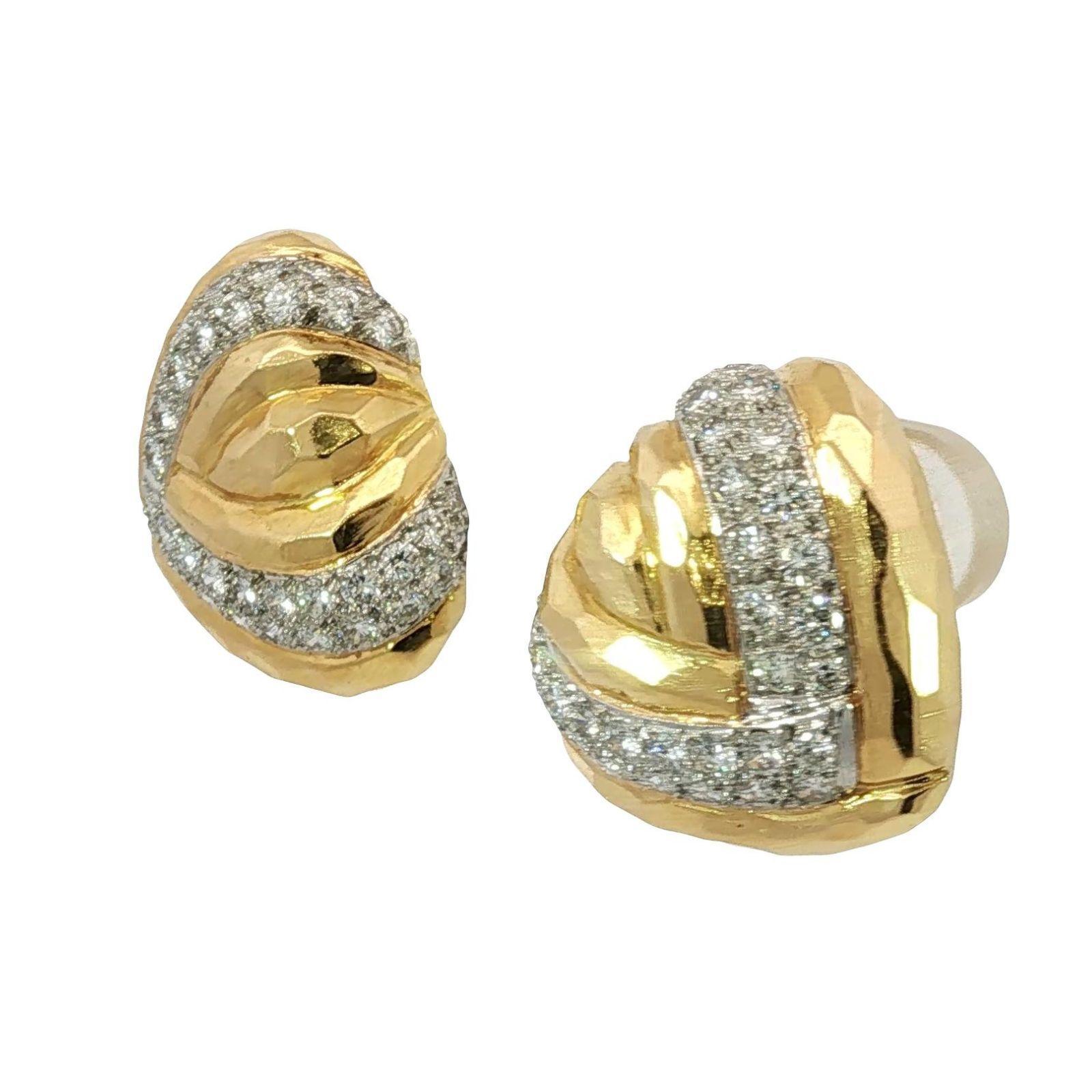Estate Diamond Heart Earrings Clip-Ons 18K White and Yellow Gold ~2.86ctw

These 18k yellow gold clip-on earrings feature a sculptural design accented with touches of white gold for contrast and depth. Set with round white diamonds totaling 2.86