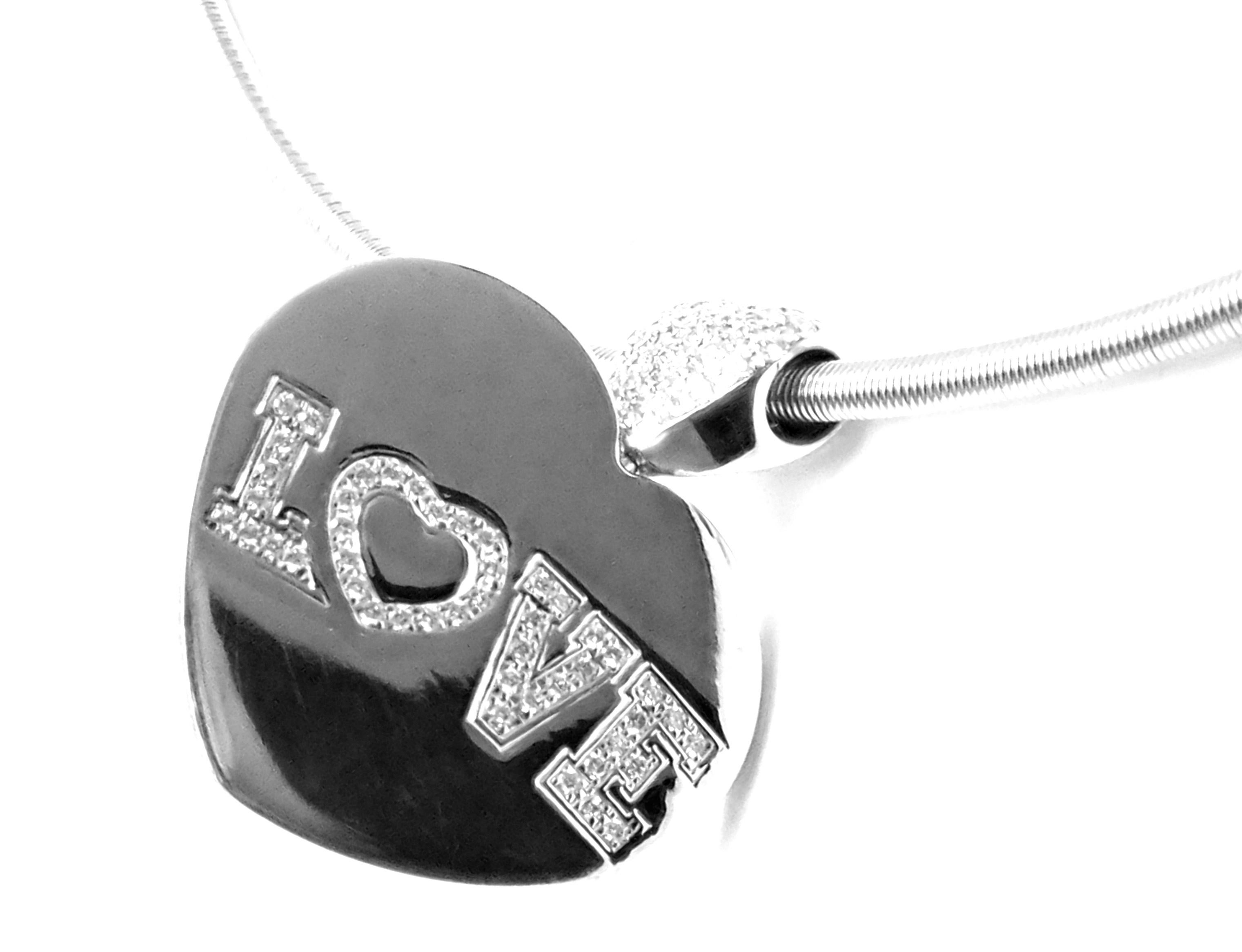 Estate 18k White Gold Diamond Love Heart Pendant Necklace.
With Round Brilliant Cut Diamonds SI1 clarity, G color total weight approximately 1ct
Details:
Pendant: 32mm x 27mm
Weight: 36.3 grams
Chain Length: 15