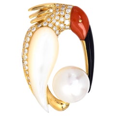 Pendentif broche oiseau Ibis en or blanc 18 carats avec diamant, perle, corail et onyx (succession)