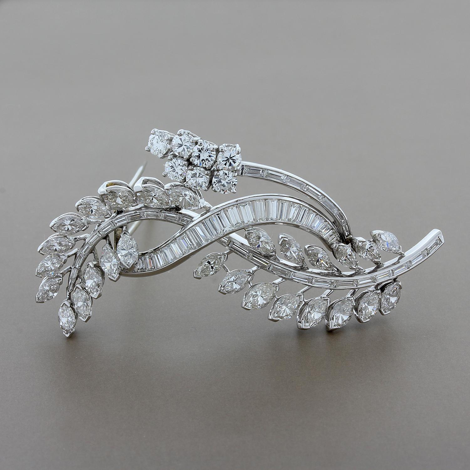 This exquisite estate brooch features 6.92 carats of sparkling white VS quality diamonds. The round cut, marquise cut and baguette cut diamonds are set in platinum because you deserve utmost luxury!

Brooch Length: 2.25 inches
Brooch Width: 1.25