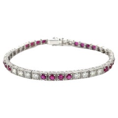 Bracciale Tennis in oro con diamanti e rubini incisi