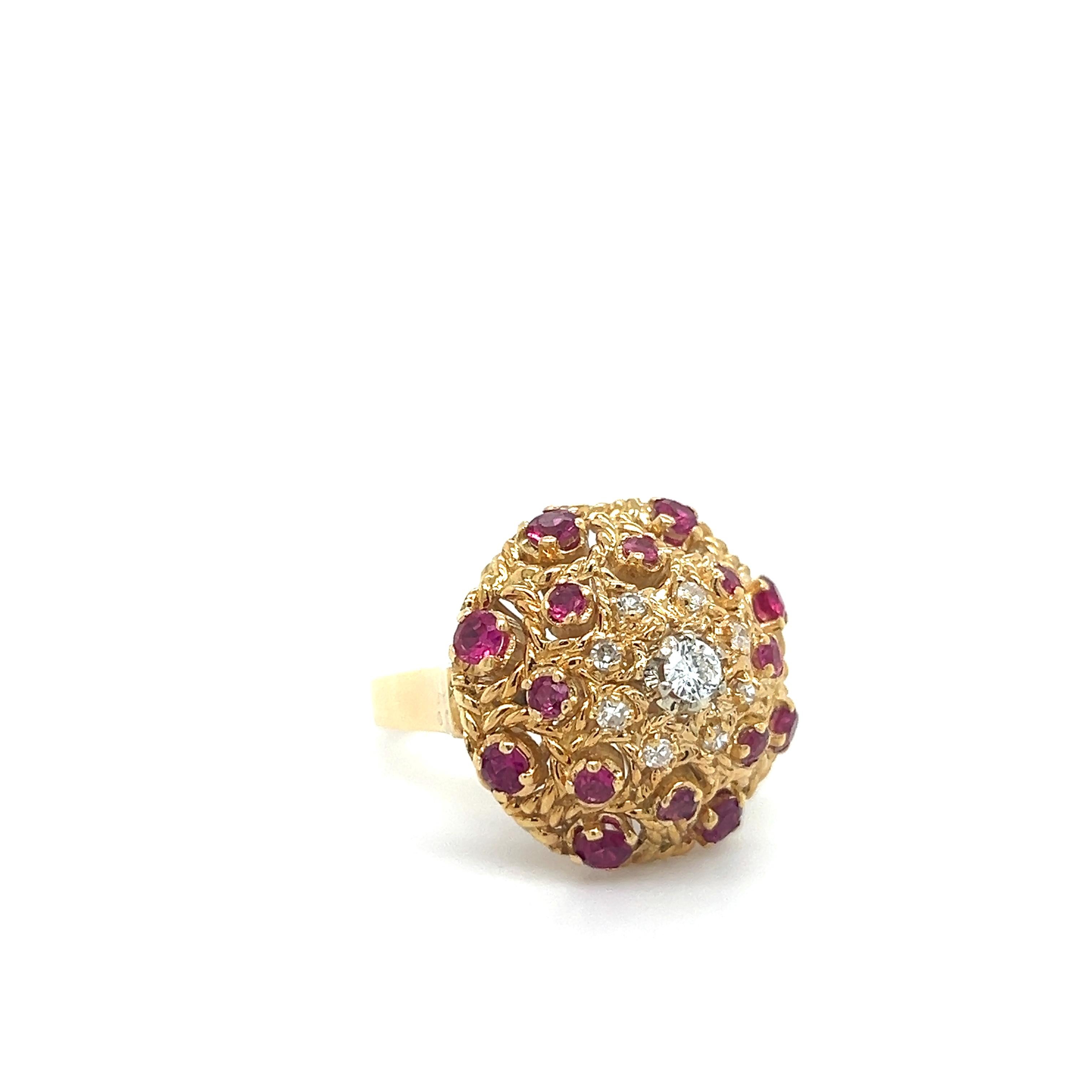 Beautiful estate collection bombe ring crafted in 18k yellow gold. Details are seen throughout as round cut rubies and diamond gemstones highlight the design. The ring showcases graduating sizes of rubies and diamonds.
There are 16 rubies in the