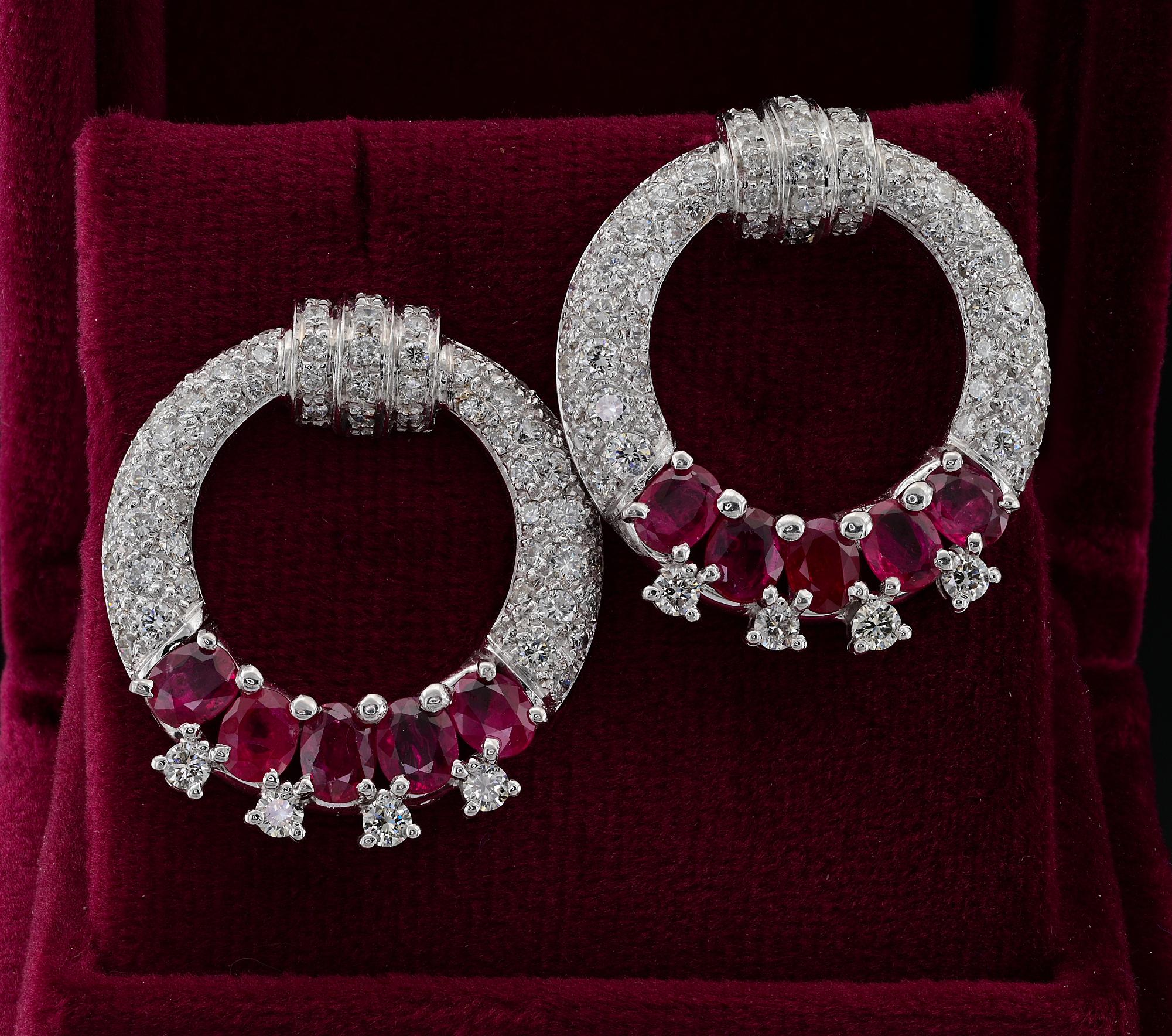 Estate large hoop earrings, beautifully hand crafted as unique
Pave set with 2.90 Ct round brilliant cut Diamonds G VVS/VS
Enhanced in the middle by an array of Natural Rubies totalling 4.35 Ct making a lovely colour contrast and effective look
They