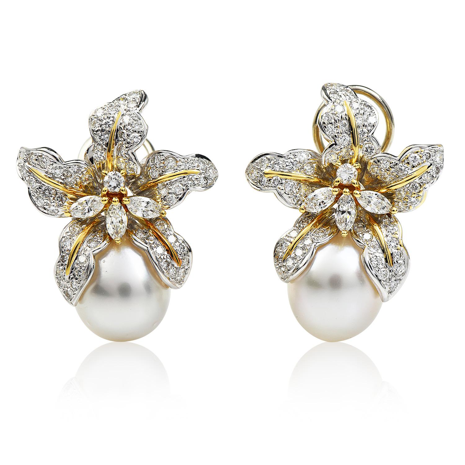 Estate Wildflower Design Ohrringe, inspiriert von den Blüten der Dancing Lady Orchid, mit unendlicher Schönheit und Funkeln.

Gefertigt in 18K Gelb- und Weißgold, sind die Blütenblätter mit 100 rundgeschliffenen, pflastergeschliffenen und 6
