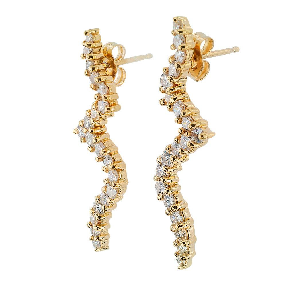 Diamond and 14 karat yellow gold zigzag design long earrings.  The earrings are set with thirty-eight round brilliant-cut diamonds totaling approximately 1.00 carat, approximately I - J color, I1 clarity.  Well crafted, contemporary designs equipped