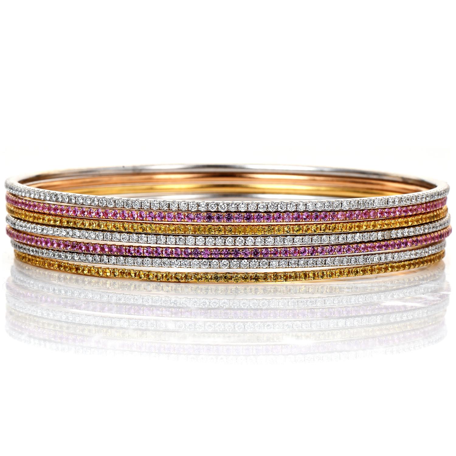 A timeless bracelet set, perfect for everyday use!

These stackable bangle bracelets are crafted in solid 18K yellow, white & rose gold and measure 8 inches around the wrist. This set is composed of seven gold bangles, from the classic 