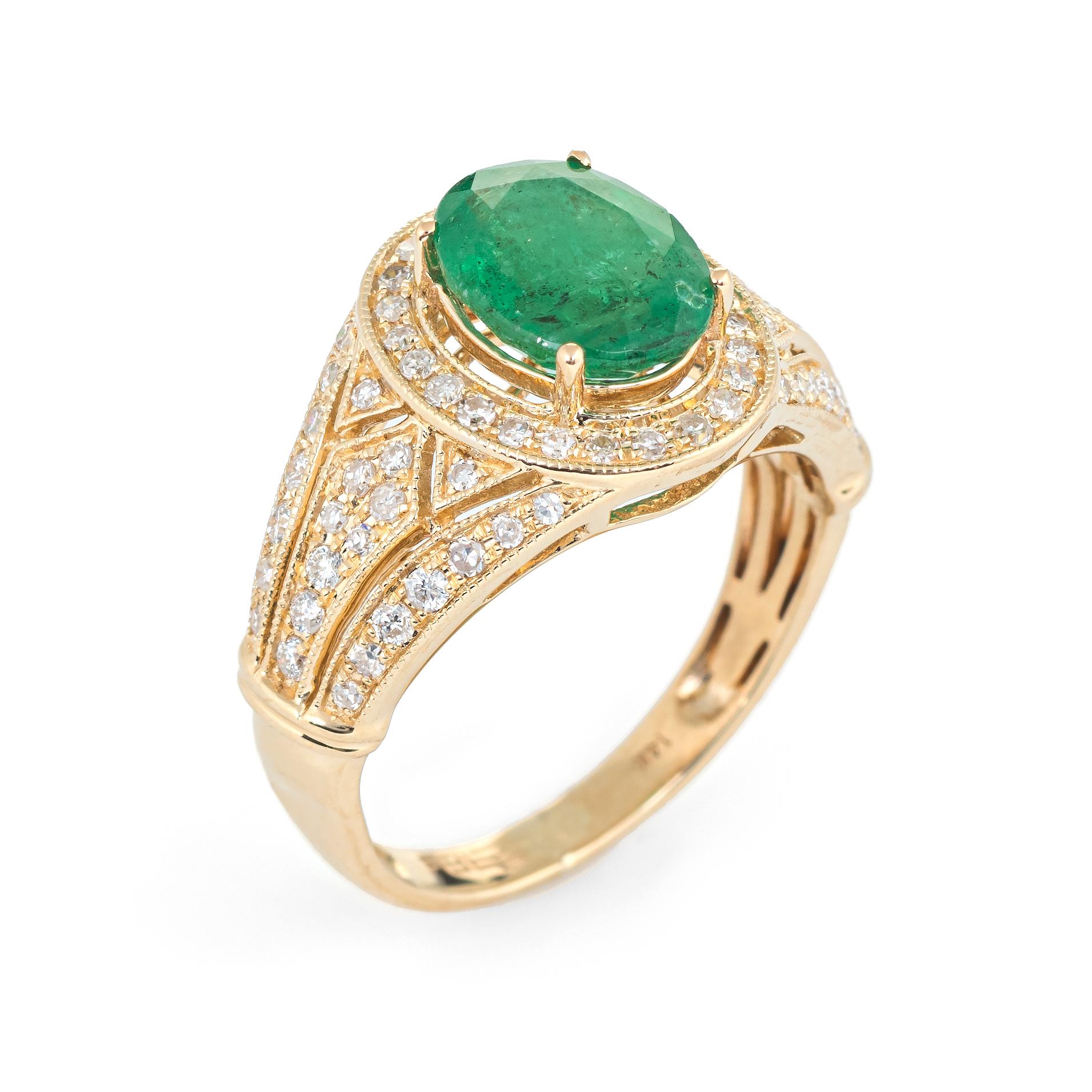 Elegant estate Effy emerald & diamond ring, crafted in 14 karat yellow gold. 

Faceted oval cut emerald measures 9mm x 7mm (estimated at 2 carats), accented with 71 estimated 0.01 single cut diamonds. The total diamond weight is estimated at 0.71