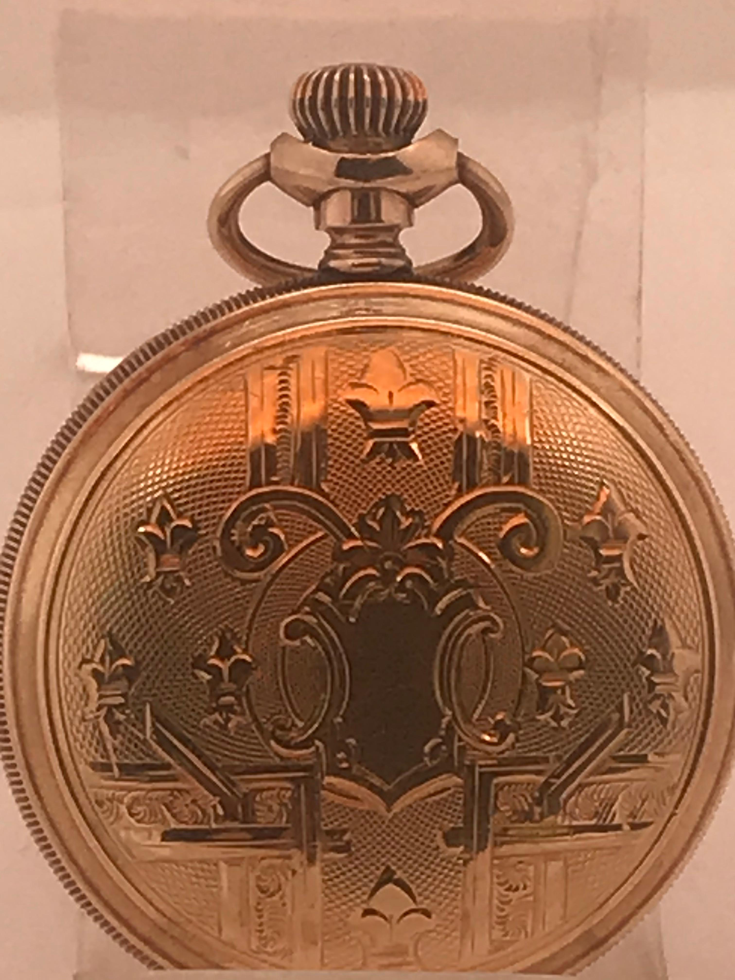 Beautiful Victorian period Elgin pocket watch, circa 1899. This gold filled beauty has a 7 jewel manual wind movement. The hunting case design with dust cover is 36mms diameter with beautiful engraving.  Serial #8915162, case #5491207.
