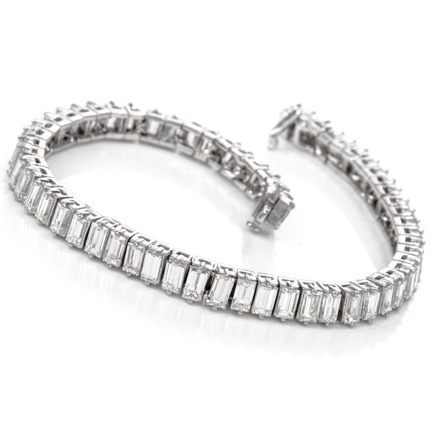 This exquisite Diamond Bracelet was inspired in a Tennis Bracelet

design and crafted in Platinum.
Running across the bracelet are 61 beautifully matched Emerald Cut
Diamonds with a combined total weight of appx. 14.08 carats and 
range from G-H