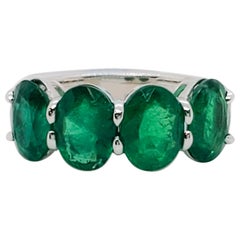 Estate Emerald Oval and White Diamond Band in 18 Karat White Gold