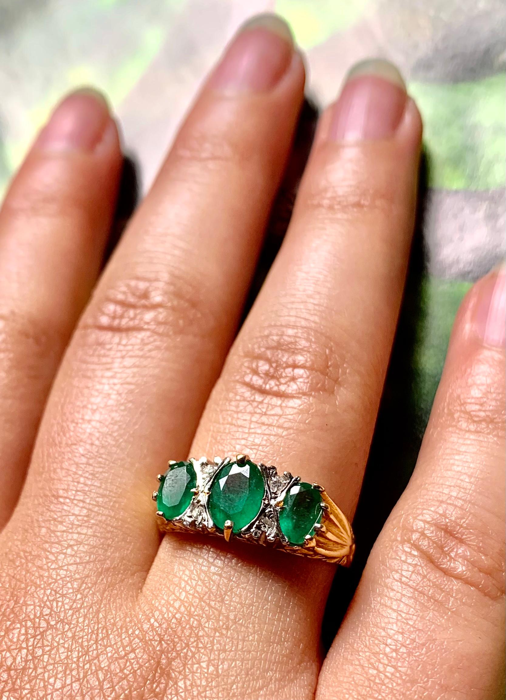 Estate Emerald Three-Stone Ring, 18 Karat Yellow Gold and Diamonds In Good Condition For Sale In New York, NY