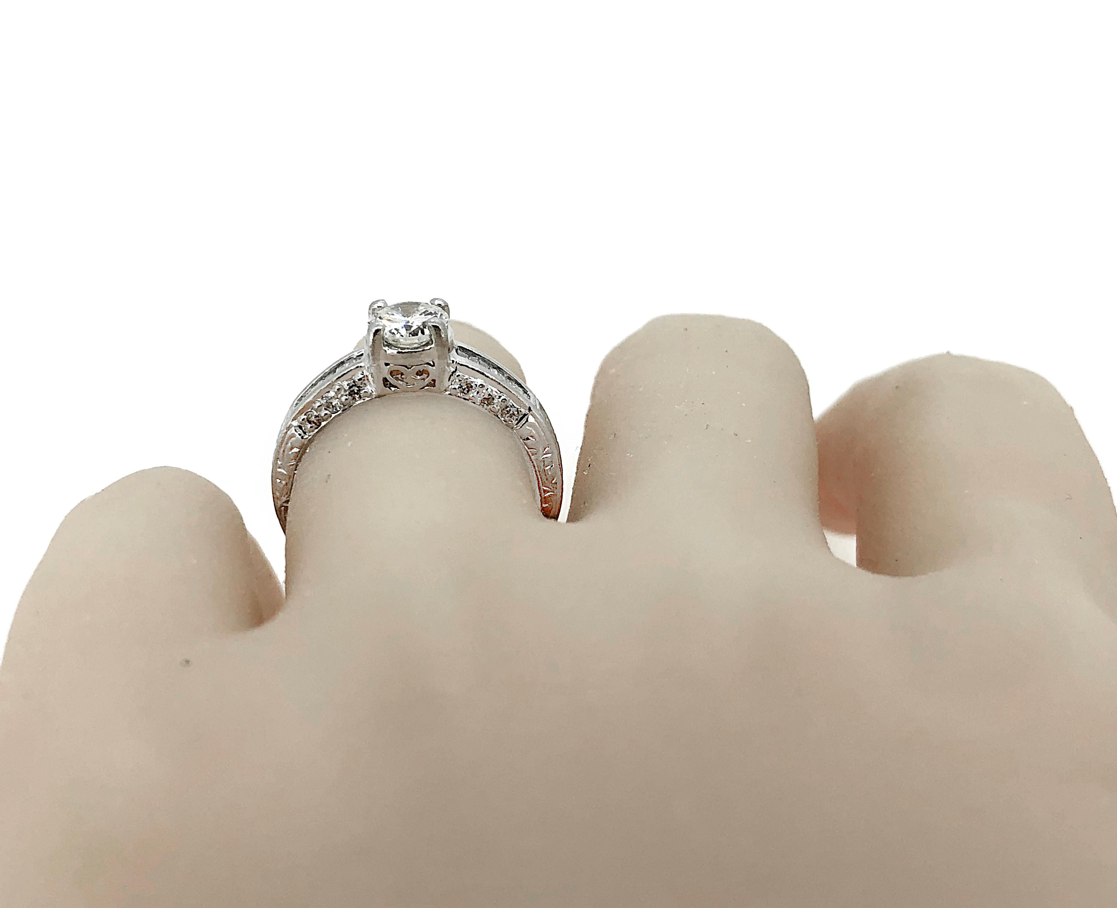 Contemporary Estate Engagement Ring .65 Carat Diamond and Platinum For Sale