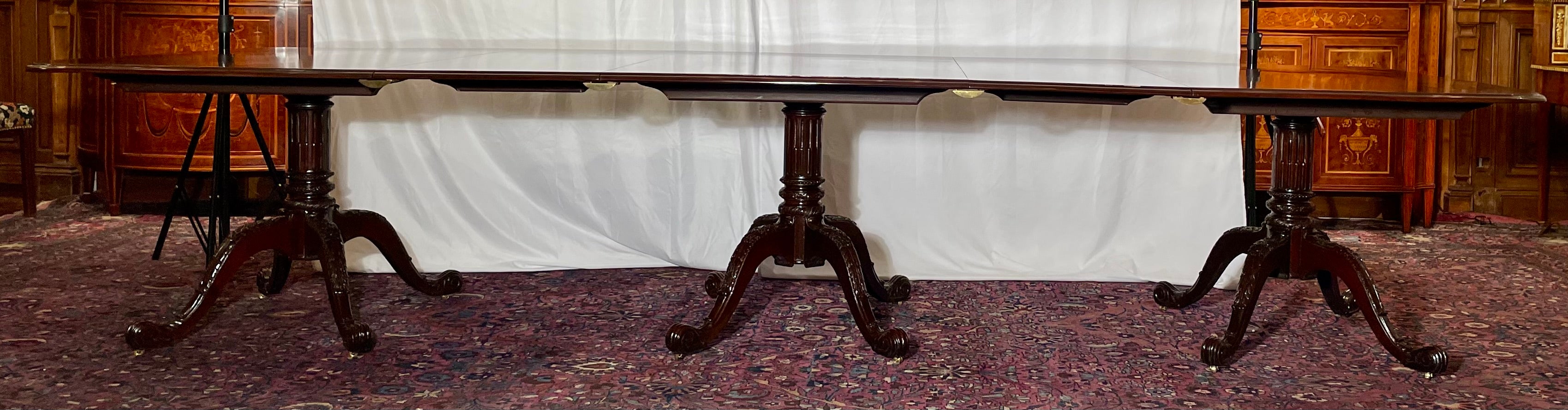 20th Century Estate English Solid Mahogany Three-Pedestal Dining Table, Circa 1950-1970.