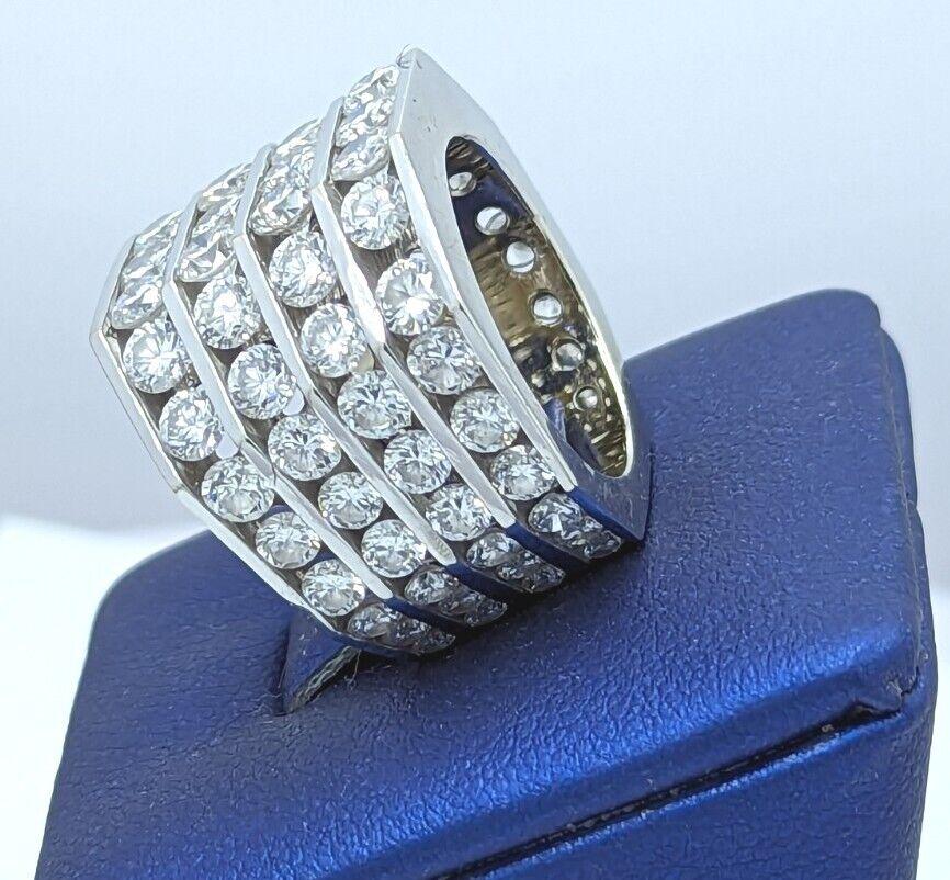 Estate Eternity 14g 14KT White Gold 7CTW Diamond 4 Row Wedding band pinky ring.
 	
Diamond: 7Ctw

There is space at the bottom for sizing

Size 5

Weight : 14KT

Diamond Color G H

Very good Sparkle VS -SI

Very Brilliant Piece of Jewelry. Ideal for