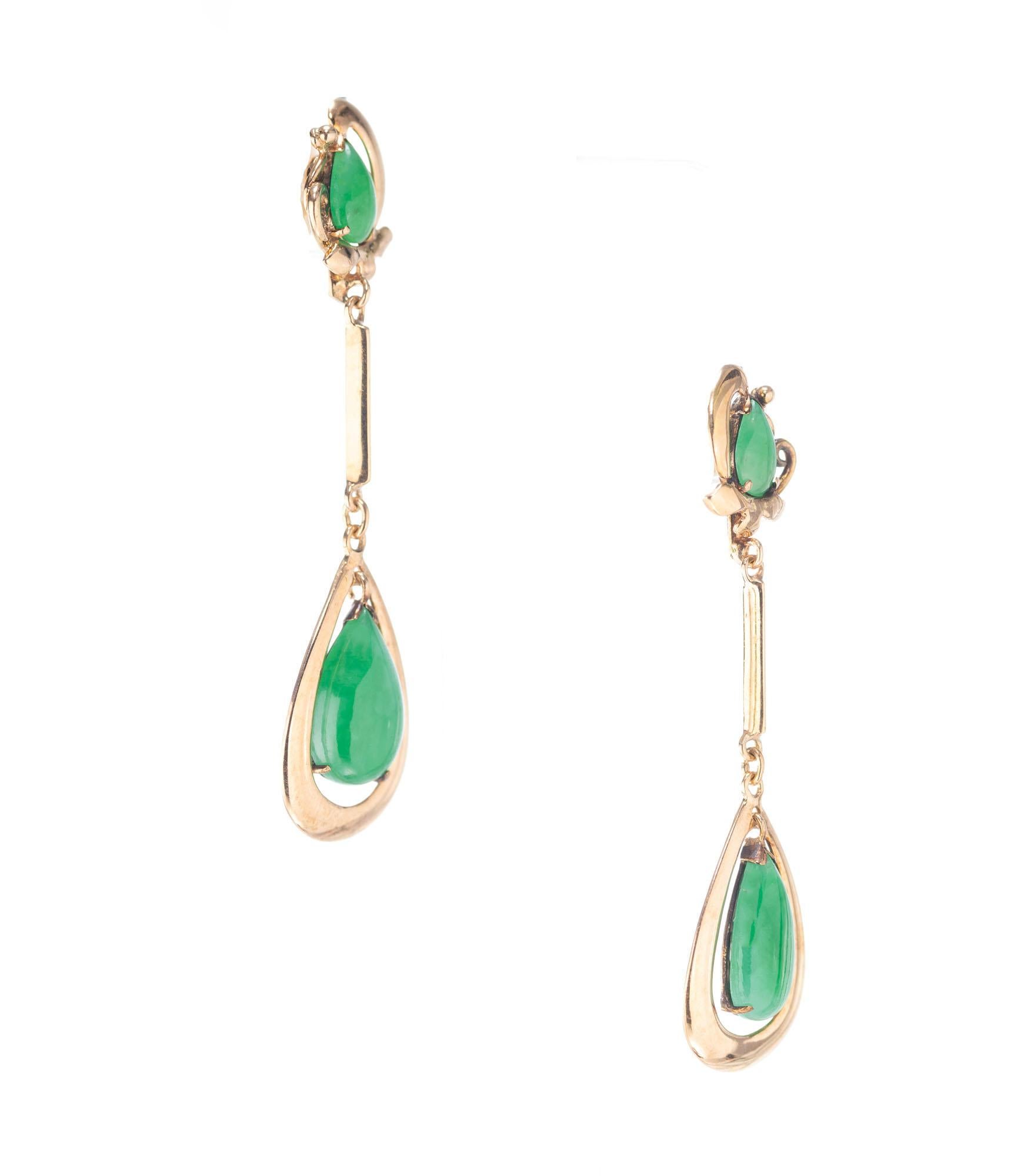 Beautiful classic 1940’s 14k rose gold European made dangle earrings. Set with genuine translucent untreated GIA Certified Jadeite Jade on the top and the bottom. The bottom pear shape stones dangle inside their frame. These have just enough motion