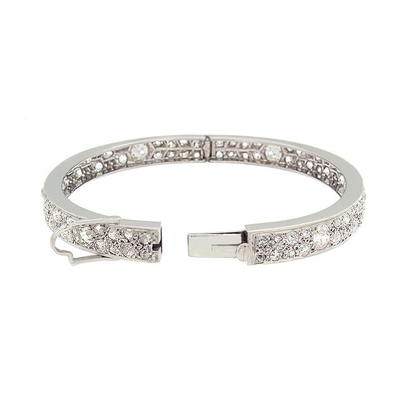 This bracelet intensely glistens all thanks to the numerous round European cut diamonds in varied sizes set closely together all over this 14K white gold bracelet. These diamonds have a collective 6 carats approximate weight. The perfect jewelry to