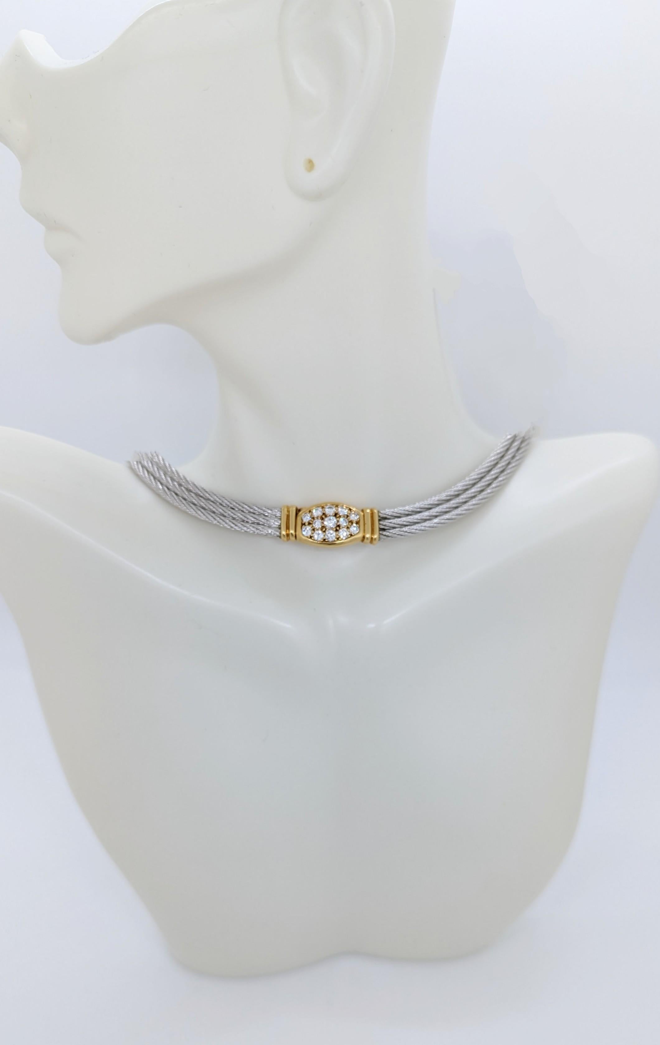 Beautiful estate Fred of Paris necklace with 1.00 ct. of good quality white diamond rounds.  Handmade in steel and 18k yellow gold.  About 13