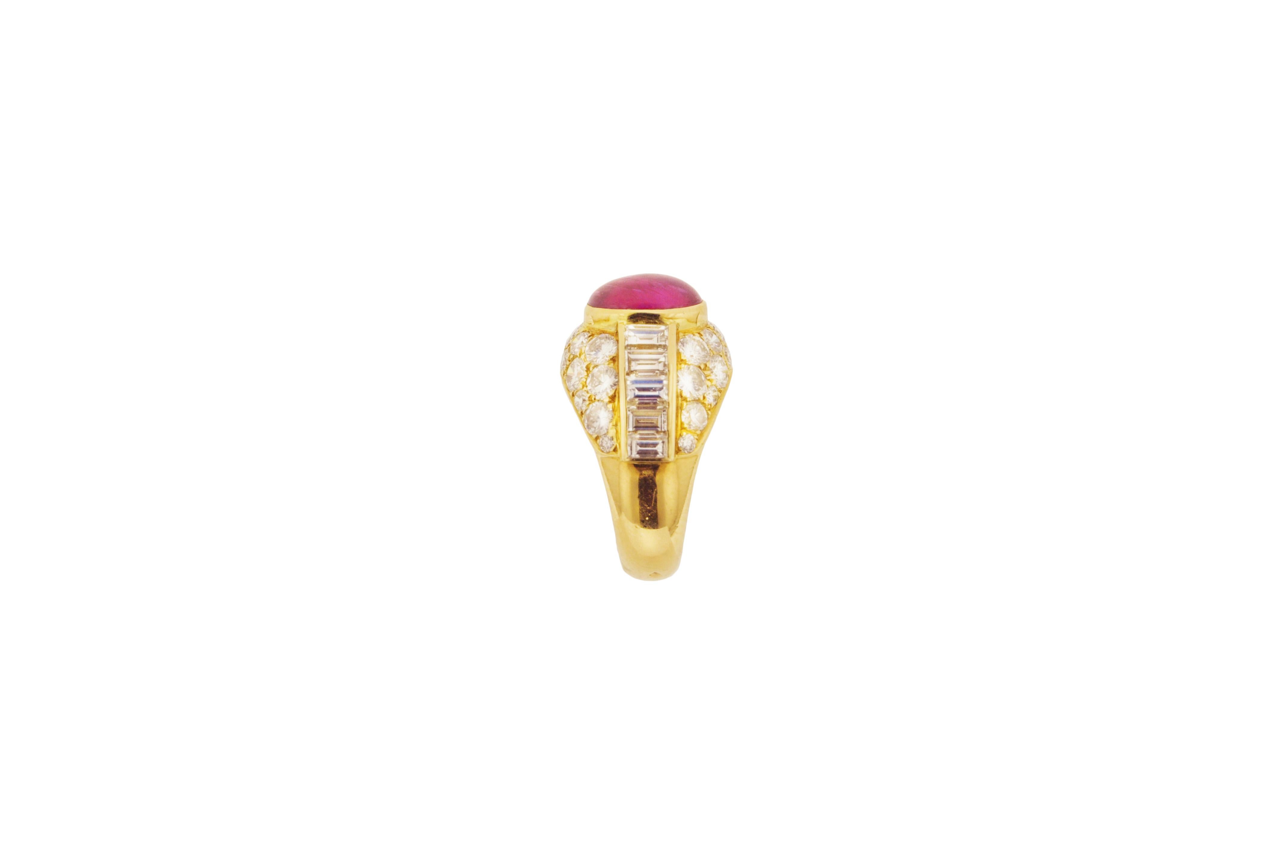18K yellow gold estate French cocktail ring featuring an approximately 3.65 carat cabochon ruby and 44 diamonds weighing approximately 3.25 carats.

Diamonds:
34 round diamonds approx. 1.90-2.00 carats
10 baguette diamonds approx. 1.30 carats

Ring