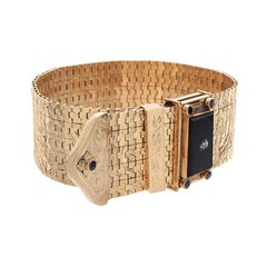 Bracciale d'oro con diamanti francesi e onice nero