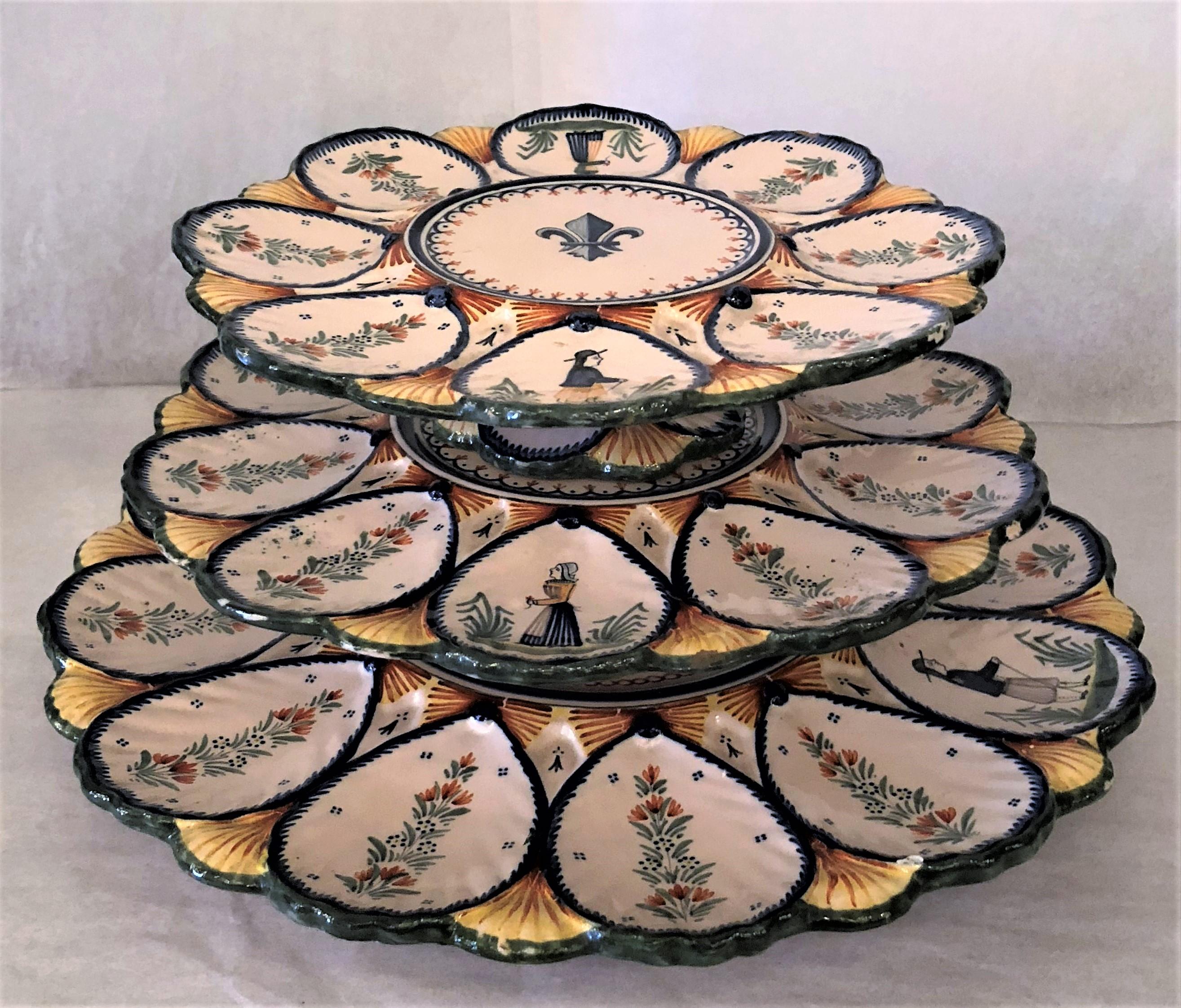 Estate French Faience 3-tiered oyster server, signed 'HR Quimper,' circa 1950.
Each of the 3 tiers are removable.