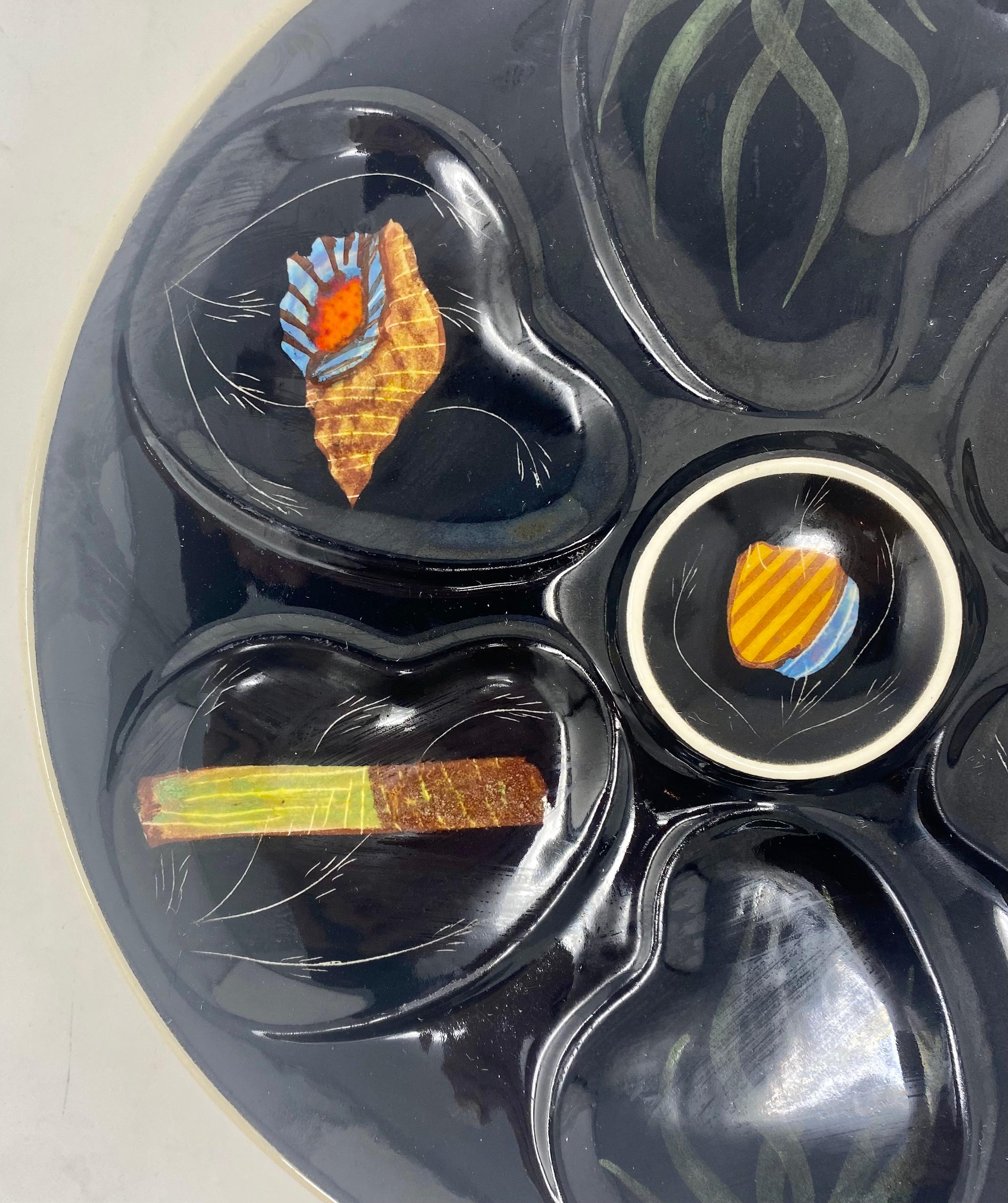 Unusual Estate French Faience Pottery Porcelain Oyster Plate Hand-Painted with Various Sea-Life on a Black Background, Signed 