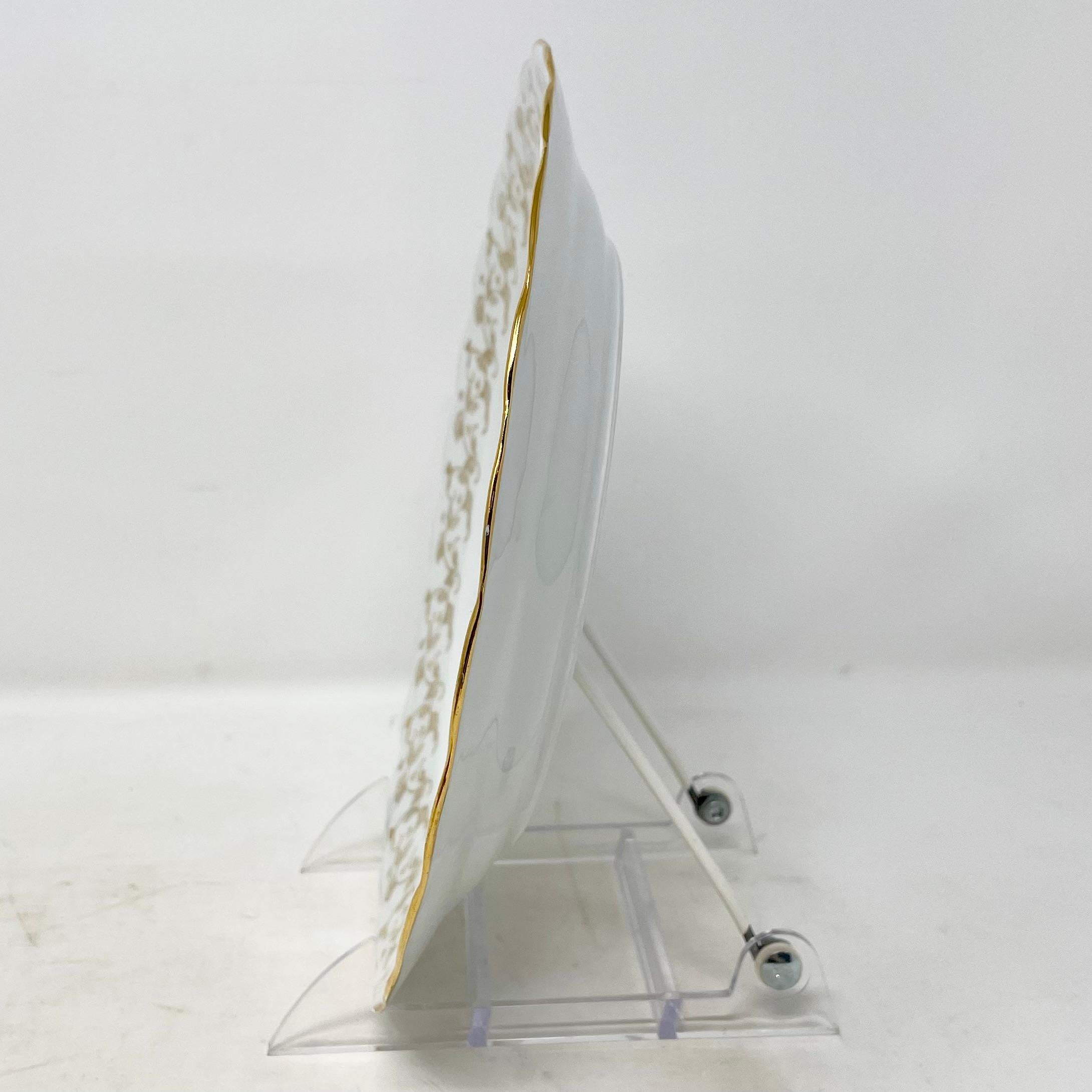 Service de 11 pièces en porcelaine de Limoges, 10 assiettes et 1 plateau en vente 6