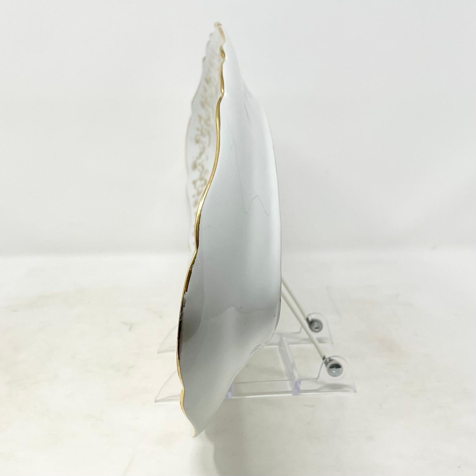 Français Service de 11 pièces en porcelaine de Limoges, 10 assiettes et 1 plateau en vente