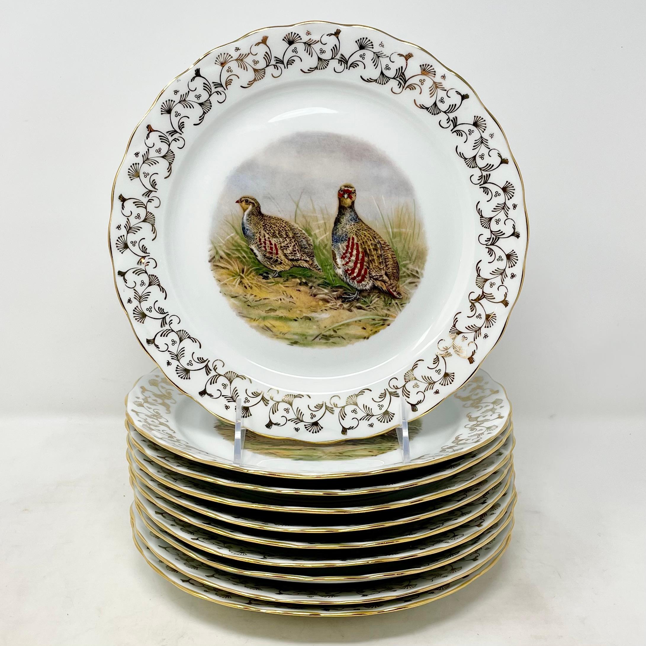 Porcelaine Service de 11 pièces en porcelaine de Limoges, 10 assiettes et 1 plateau en vente