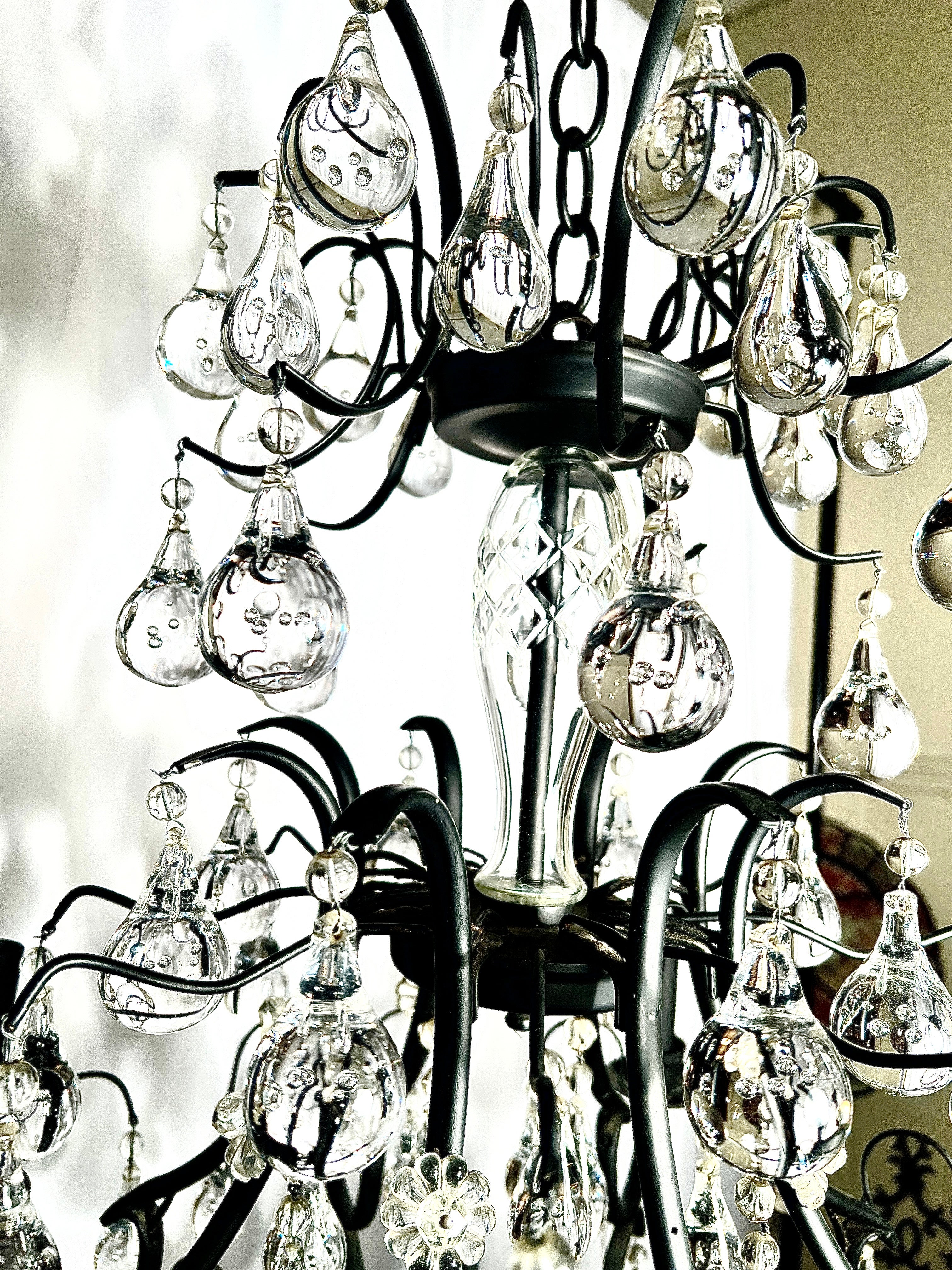 Estate French Wrought Iron and Crystal Chandelier, Circa 1950's.
With crystal teardrop prisms.