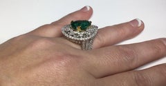 Estate GIA Certified 18 Karat White Gold 8.48 Carat Emerald and Diamond Ring