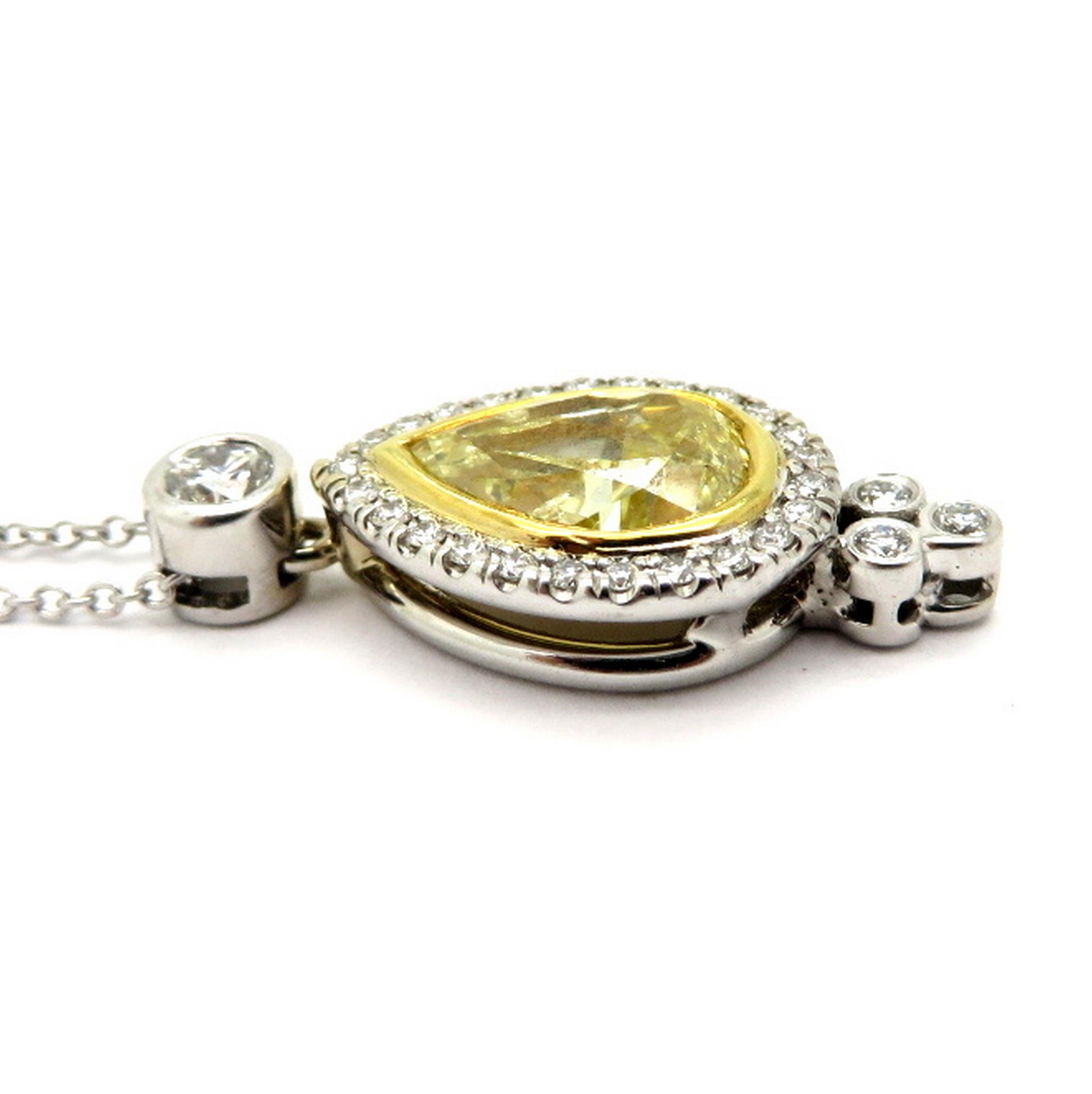 Estate GIA zertifiziert fancy gelben birnenförmigen Diamanten Halskette. In der Mitte befindet sich ein gelber, birnenförmiger Diamant mit GIA-Zertifikat und einem Gewicht von etwa 1,52 Karat. Abmessungen: 8.9 x 6,2 x 3,92 mm. Das GIA-Zertifikat ist