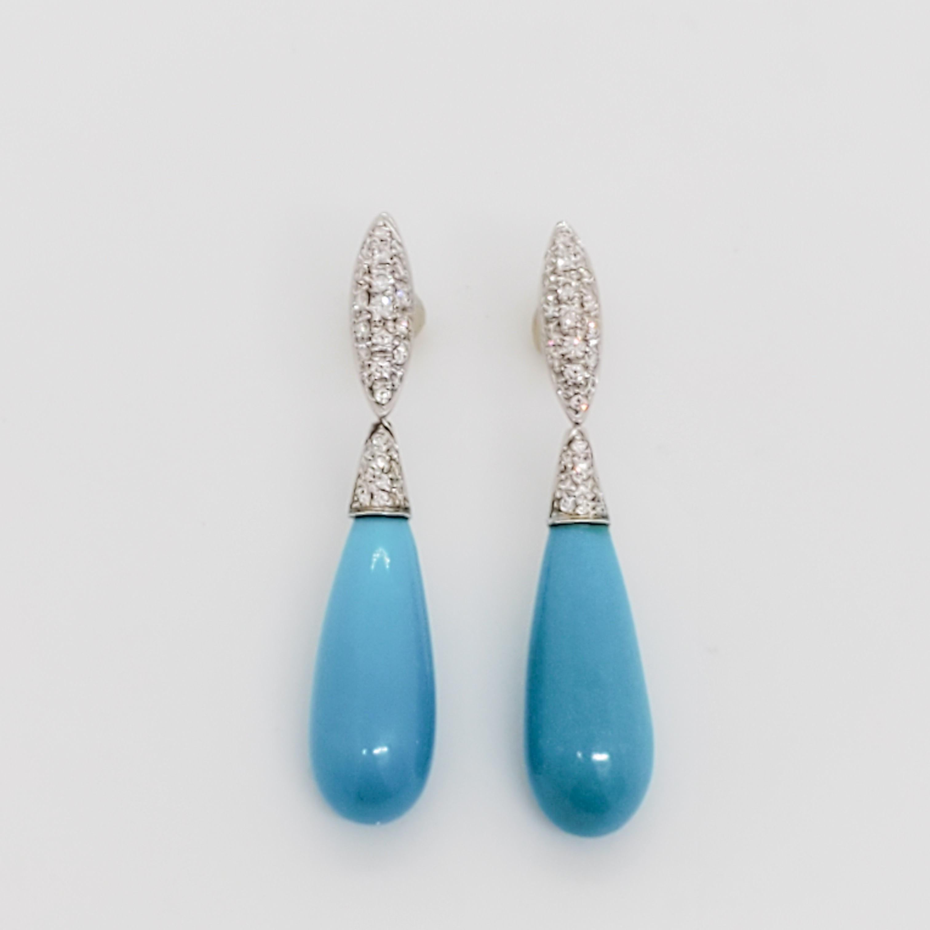 Beautiful earrings with 2.30 ct. of bright blue turquoise drops and 0.32 ct. good quality white diamond rounds.  Handmade in 18k white gold.  Made in Italy.