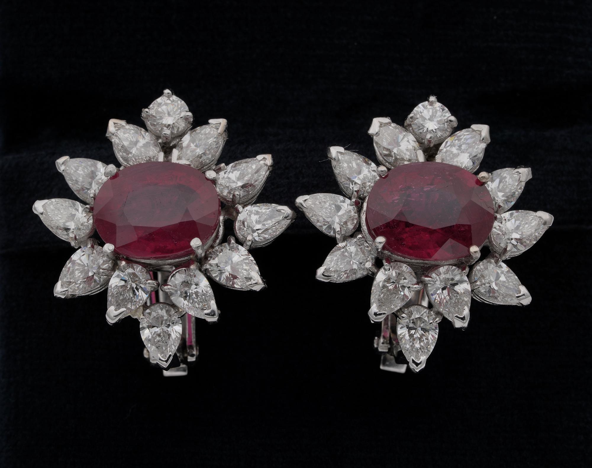 This superb pair of Vintage earrings are 1950 ca.
They express all the timeless glam of that era in a skilfully hand workmanship rendered of solid 18 Kt white gold
Marked with assay and maker punch
Designed in a cluster of natural Red Rubies and