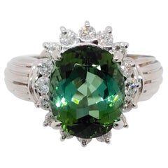 Estate Green Garnet Oval and White Diamond Ring in Platinum