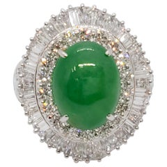 Estate Green Jade Oval Cabochon and White Diamond Cocktail Ring in Platinum Estate Green Jade Oval Cabochon and White Diamond Cocktail Ring in Platinum