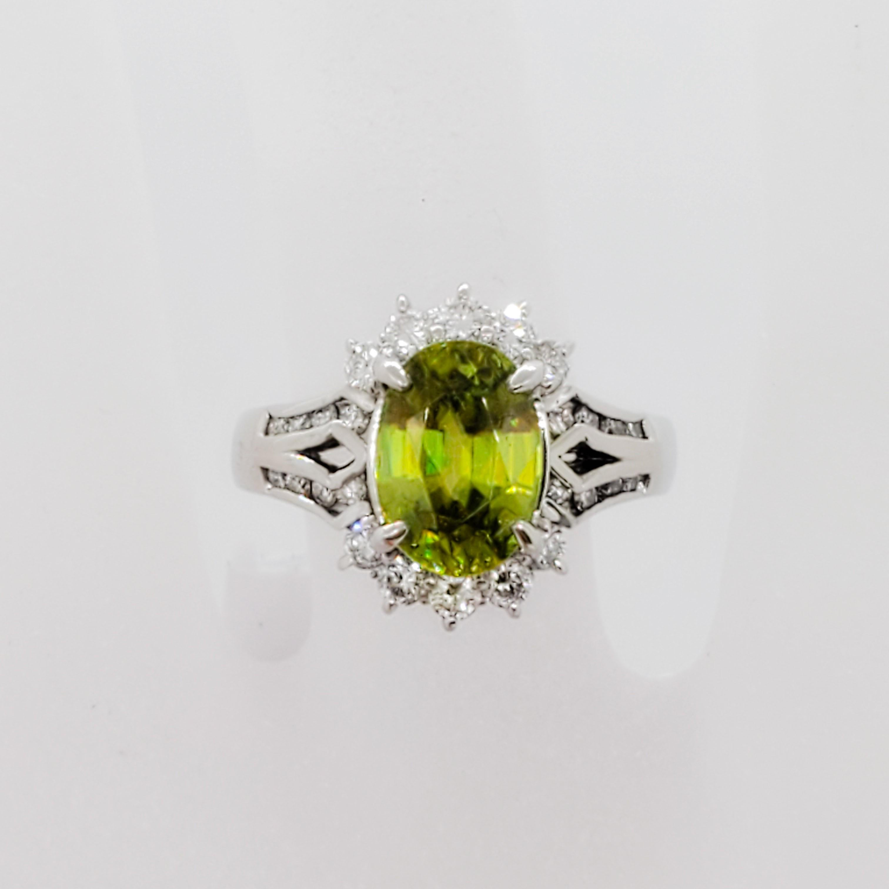 Oval Cut Estate Green Sphene Oval and White Diamond Cocktail Ring in Platinum
