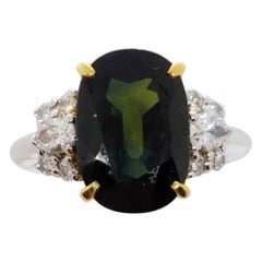 Estate Green Tourmaline Oval and White Diamond Ring in 18 Karat Yellow Gold
