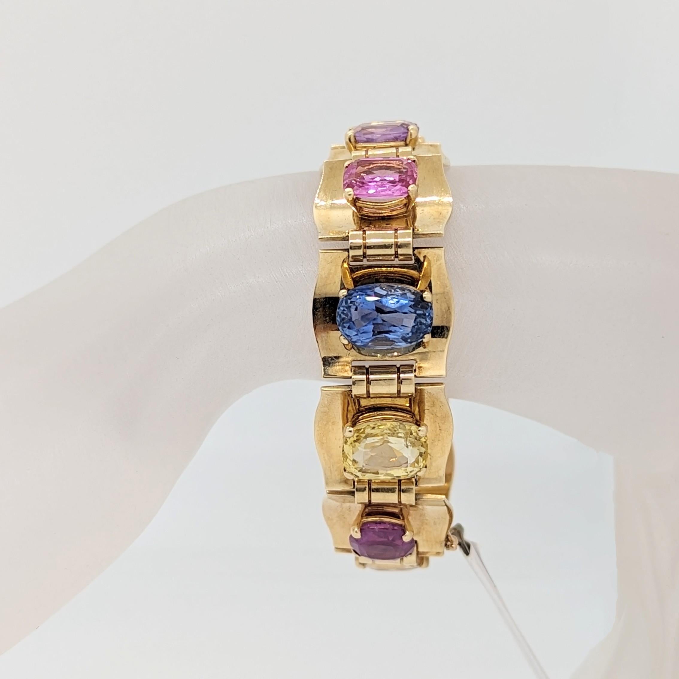 Absolutely gorgeous estate Raymond Yard multi color sapphire bracelet.  There are a total of 9 cushions and 1 oval that make a total carat weight of 47.50 ct.  Handmade in 14k rose gold.  Length is 7