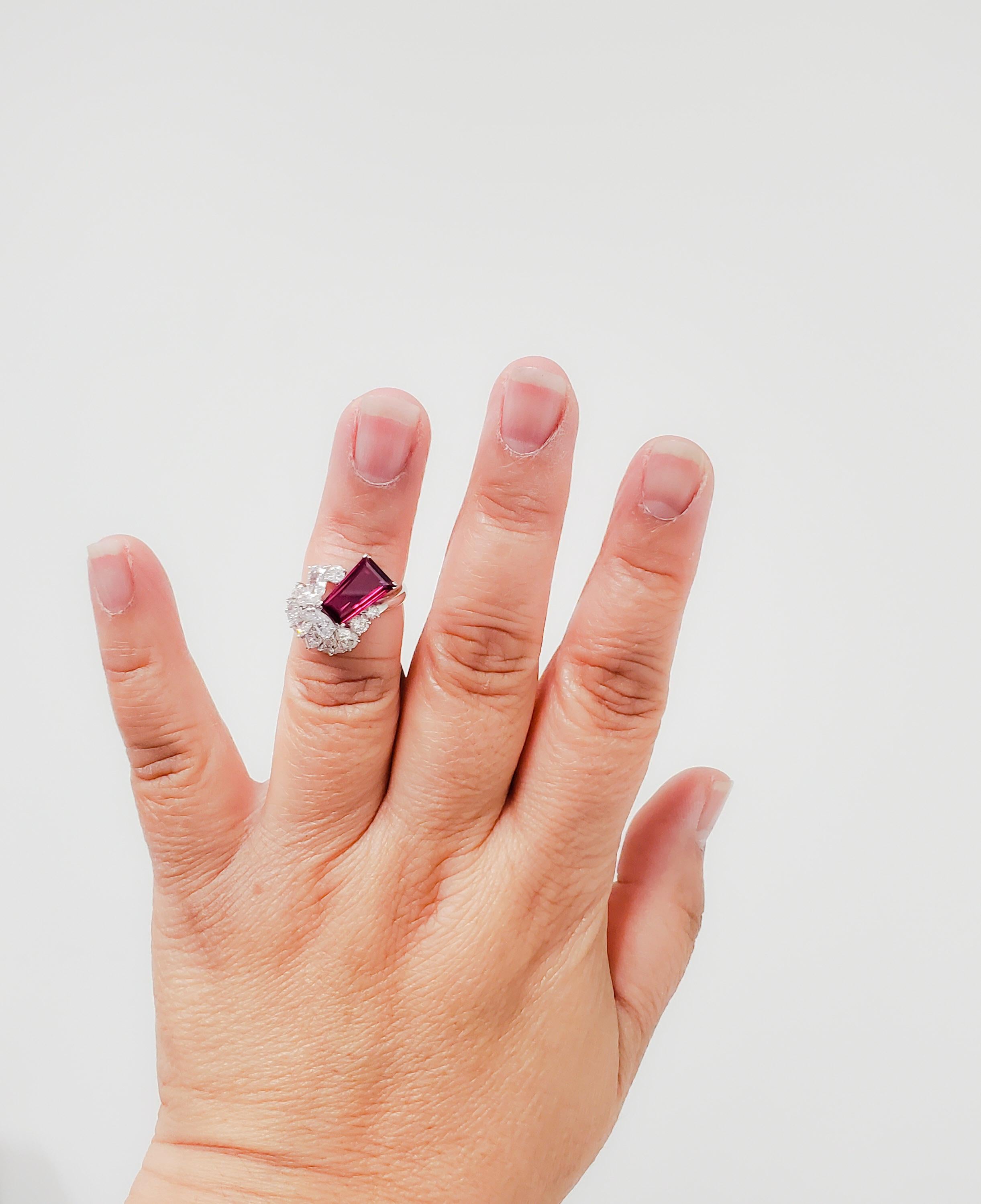 Gorgeous 2.64 ct. deep red ruby trapezoid with 1.69 ct. good quality white diamond round, pear shape, and marquise diamonds.  Handmade in platinum ring size 6.  Comes with GRS certificate.