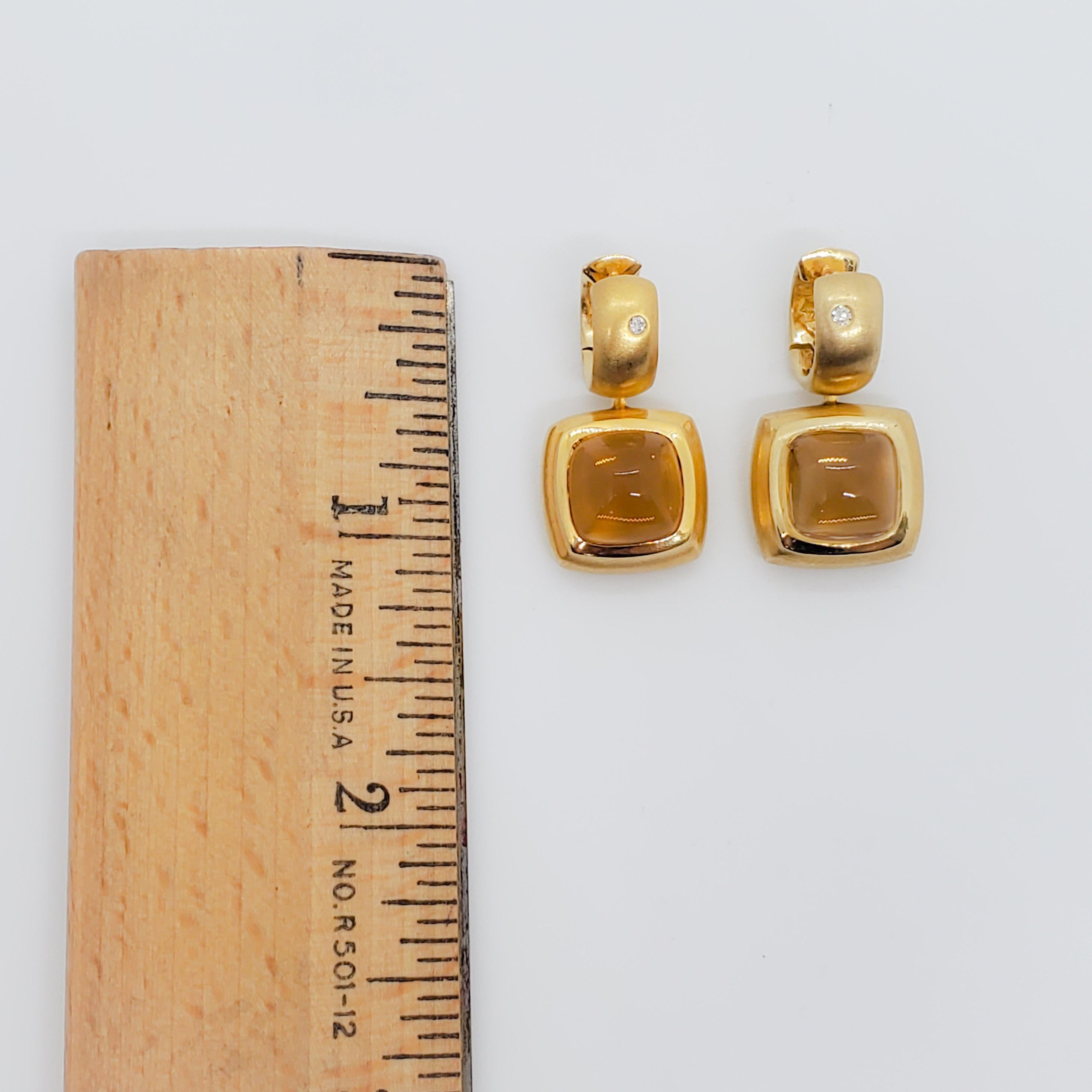 Gorgeous 6.00 ct. citrine cabochon squares with 0.02 ct. white diamond rounds.  Handmade 18k yellow gold mountings.